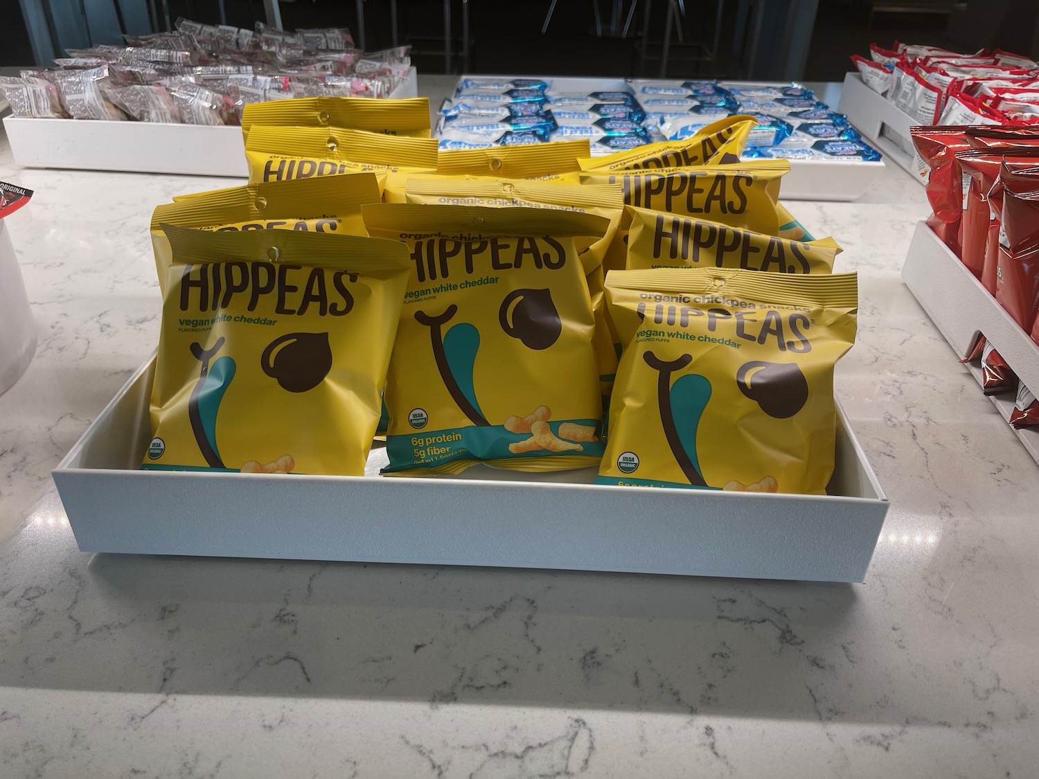 a group of bags of snacks on a counter