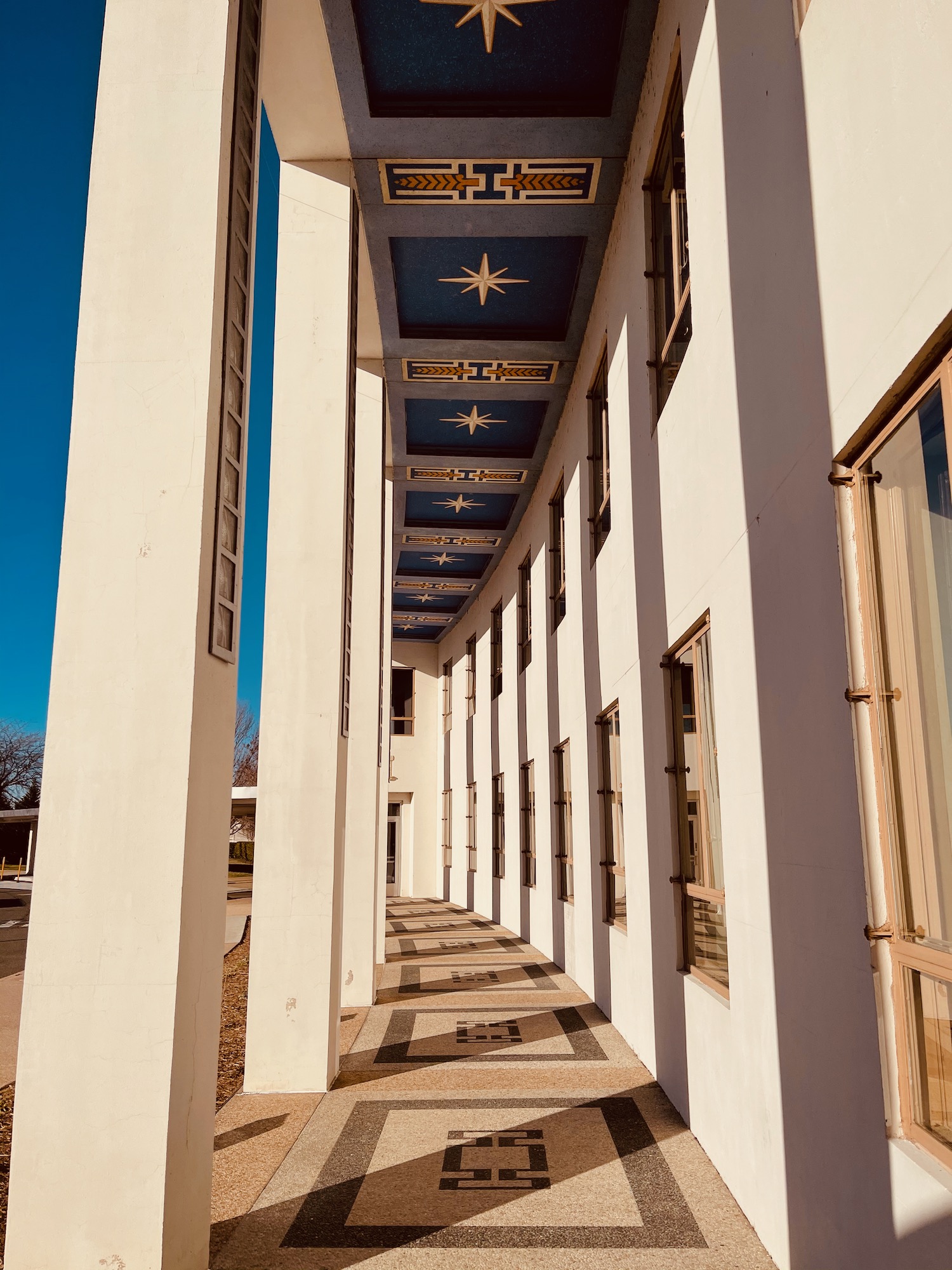 a building with a blue and white ceiling