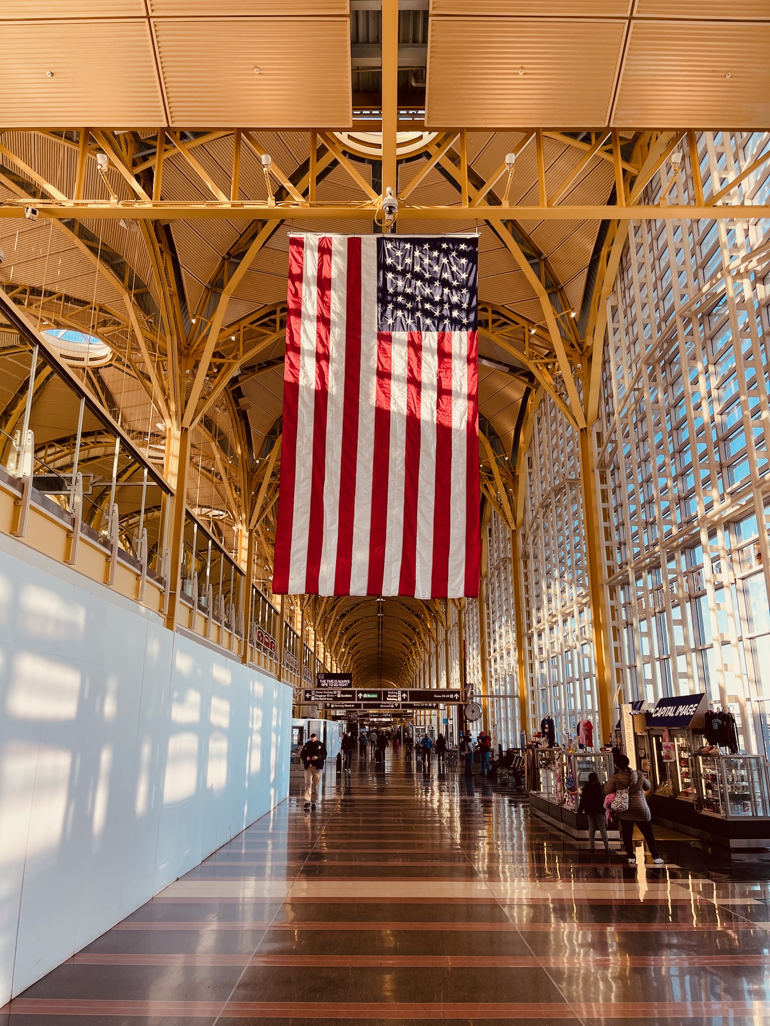 a large flag from the ceiling of a building