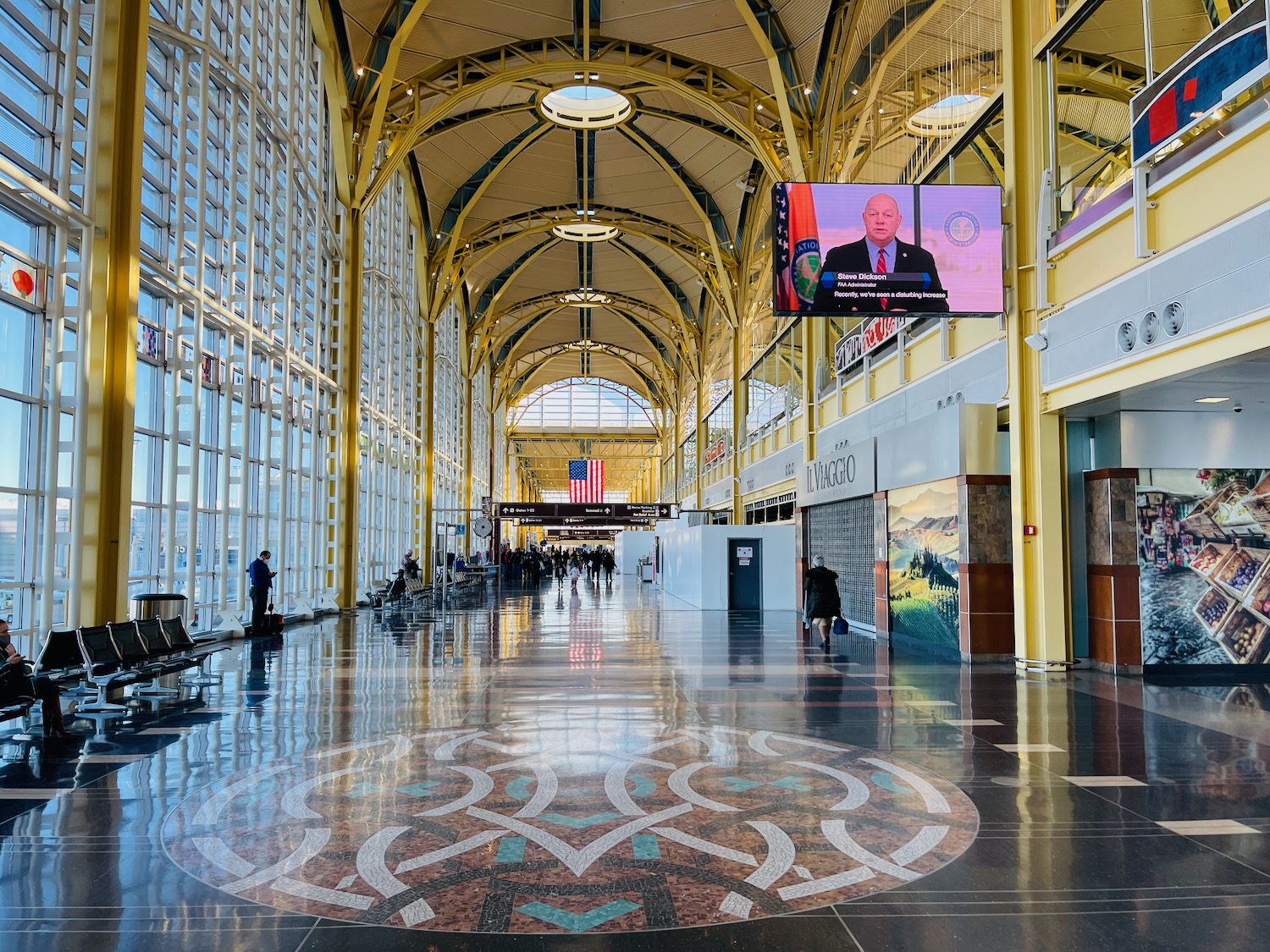 a large building with a tiled floor and a television