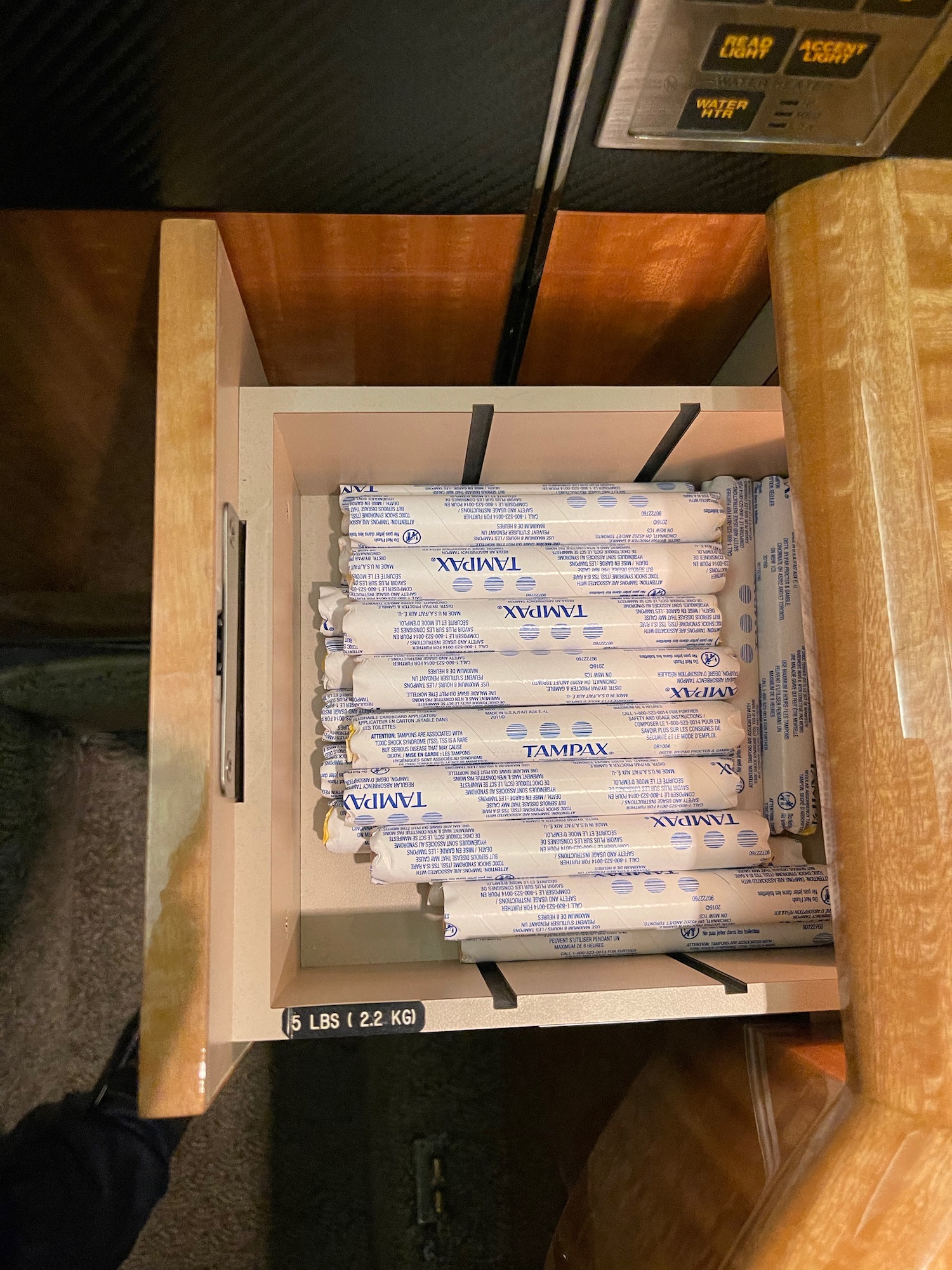 a drawer full of paper rolls