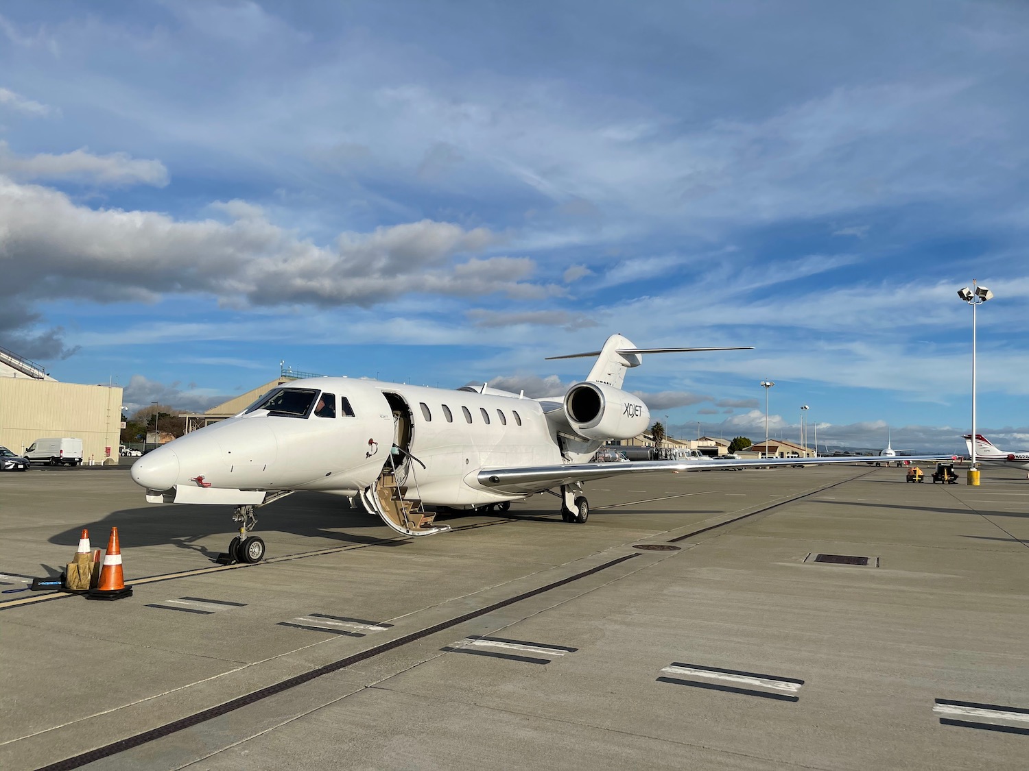 a white airplane on a runway