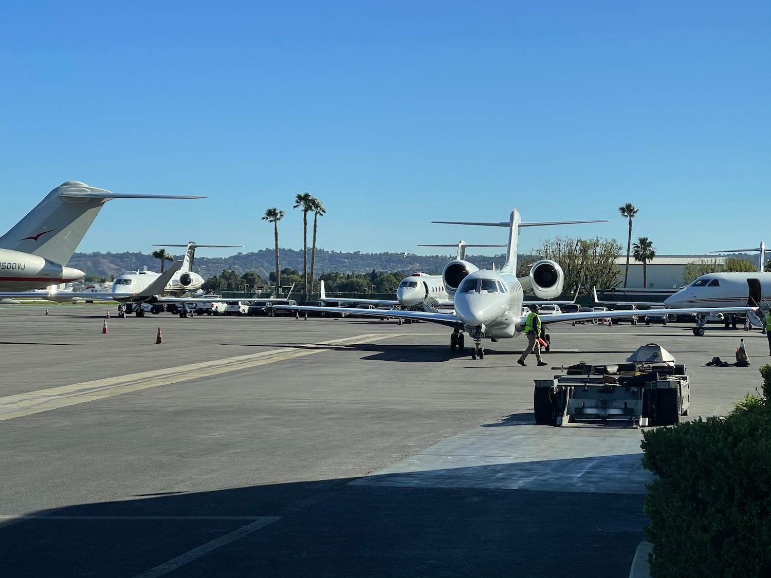 a group of airplanes on a runway