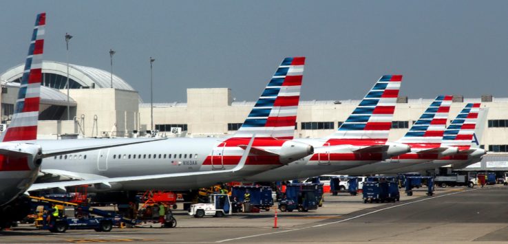 airplanes parked at an airport