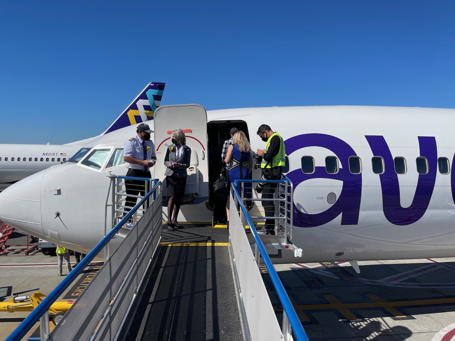 people boarding an airplane