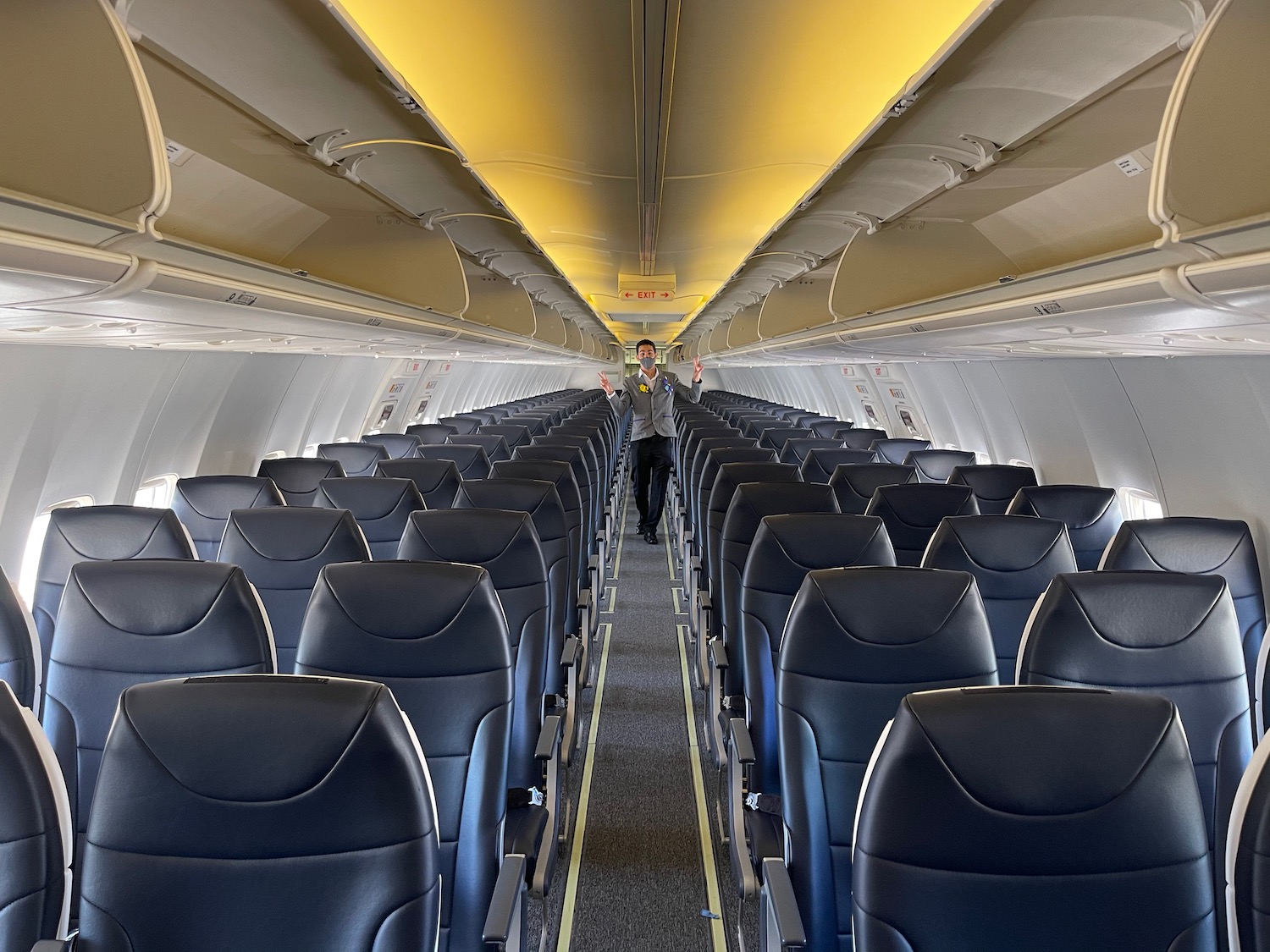 a man standing in an airplane