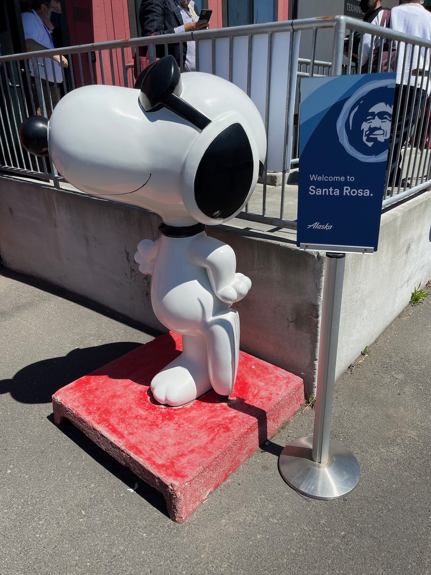 a statue of a dog on a platform