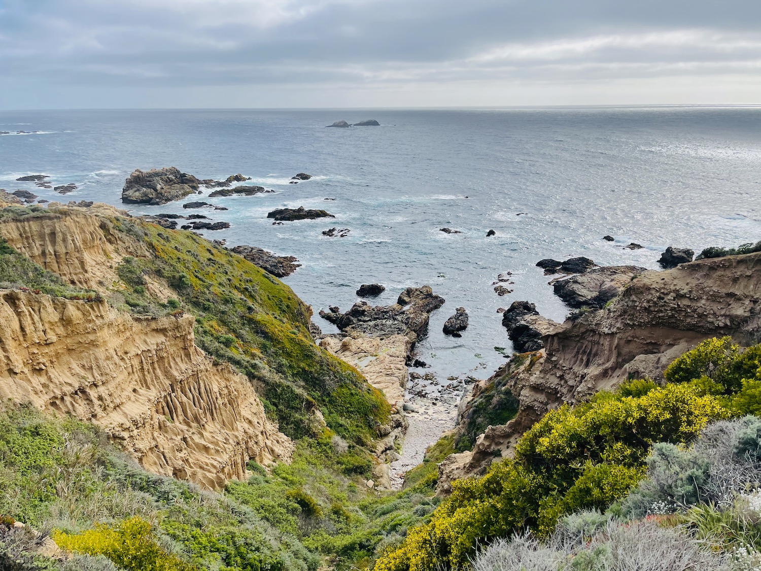 a rocky cliffs and water