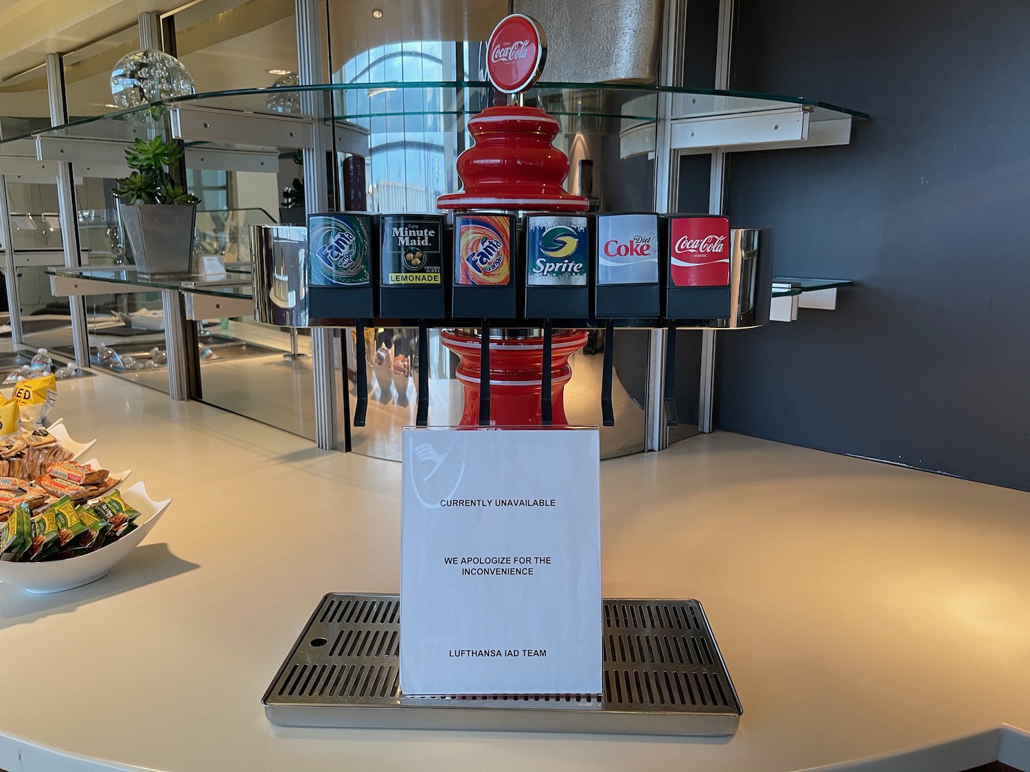 a soda dispenser on a table