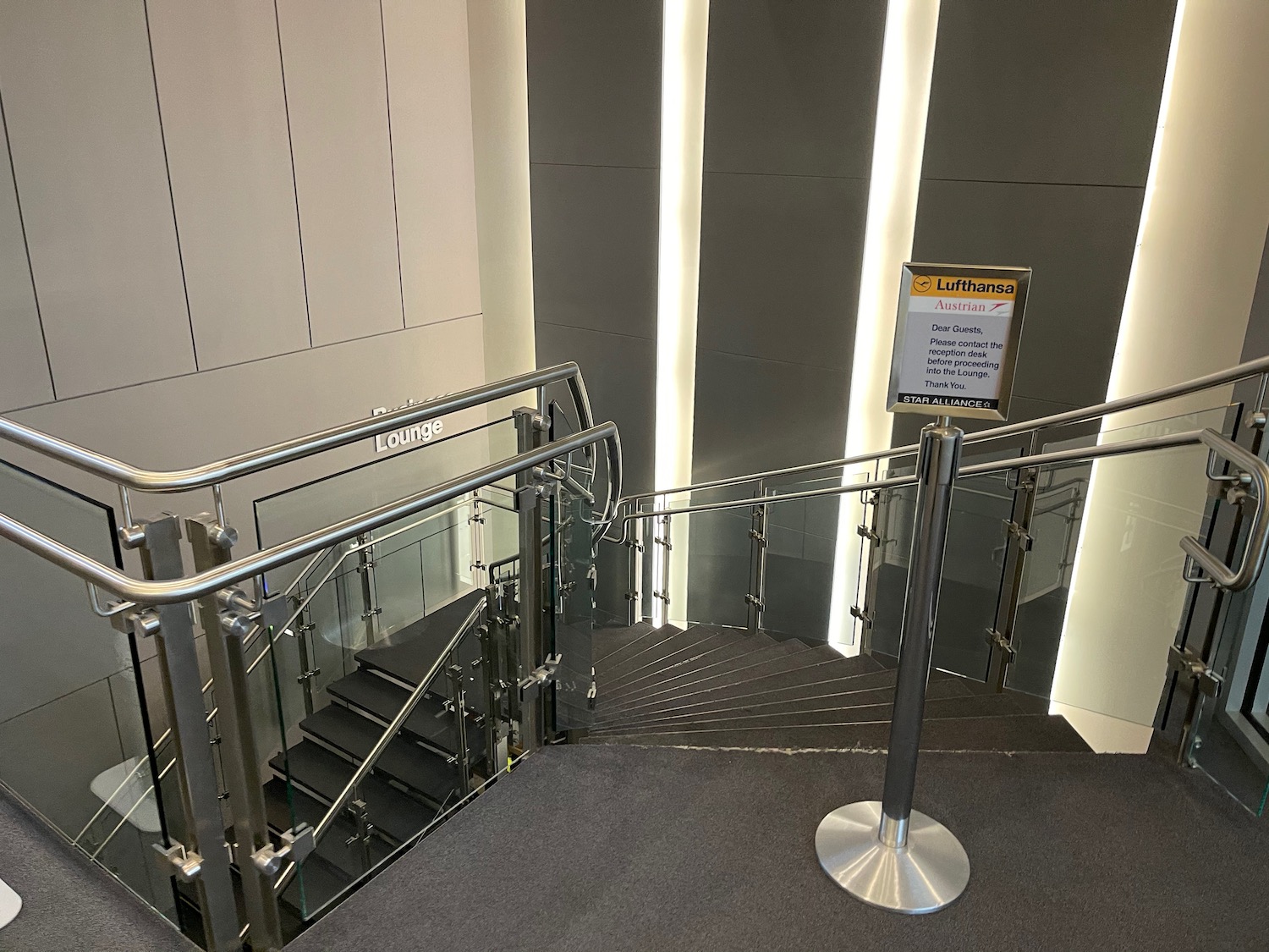 a staircase with a metal railing