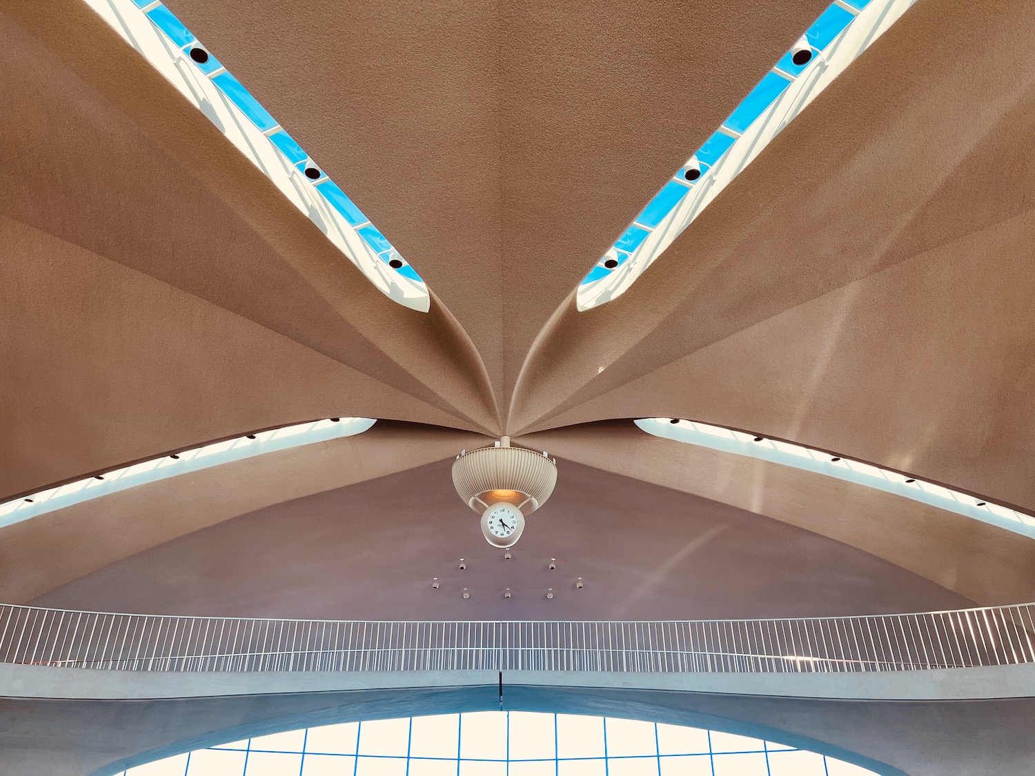 a clock from the ceiling