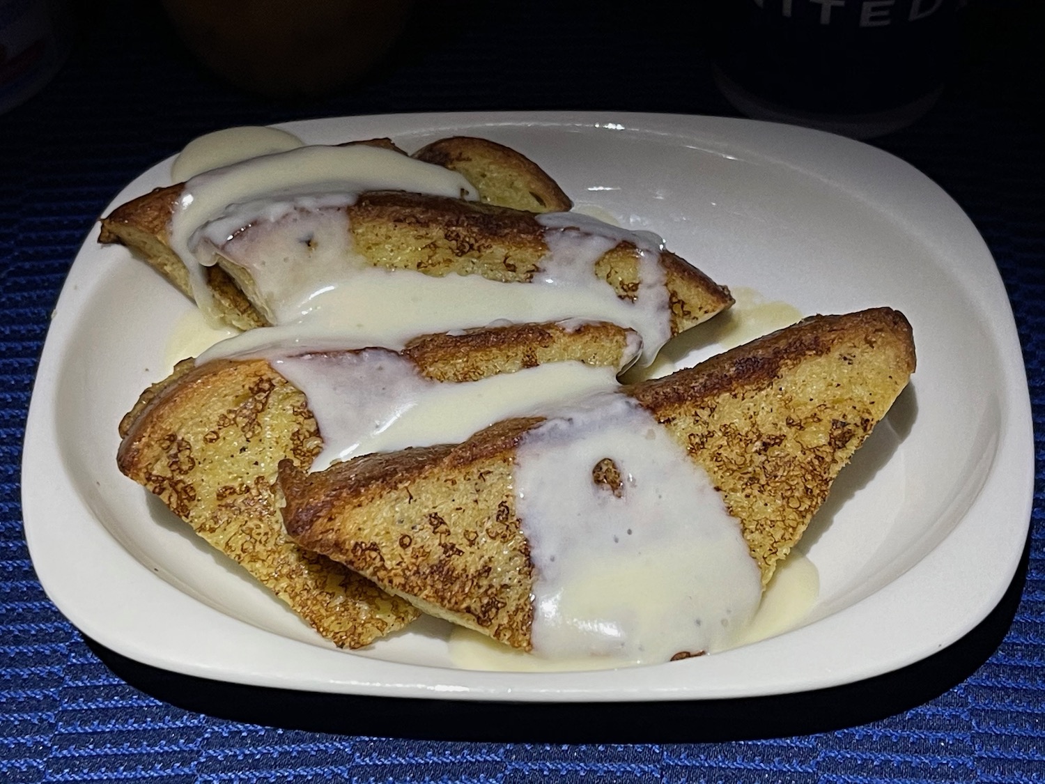 a plate of food with white sauce