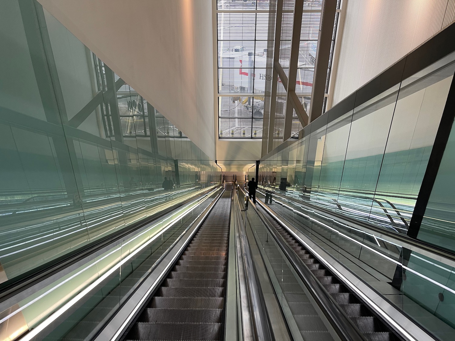 a group of people on an escalator