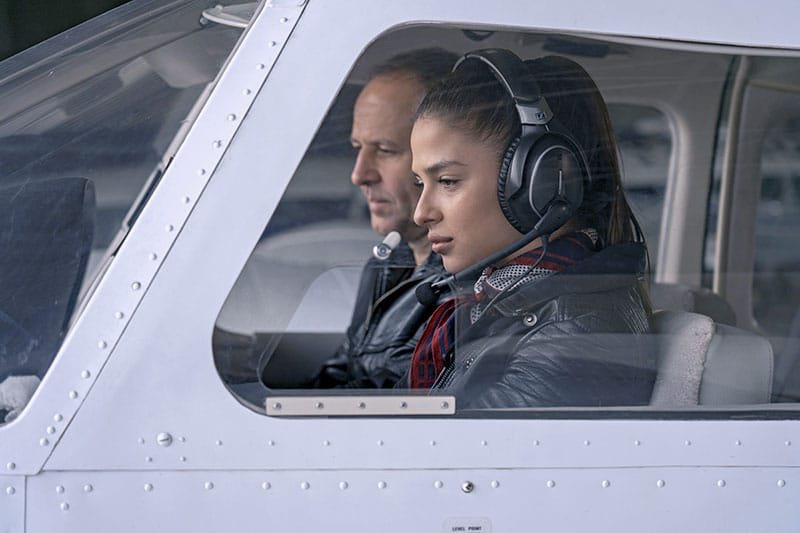 a man and woman in a plane