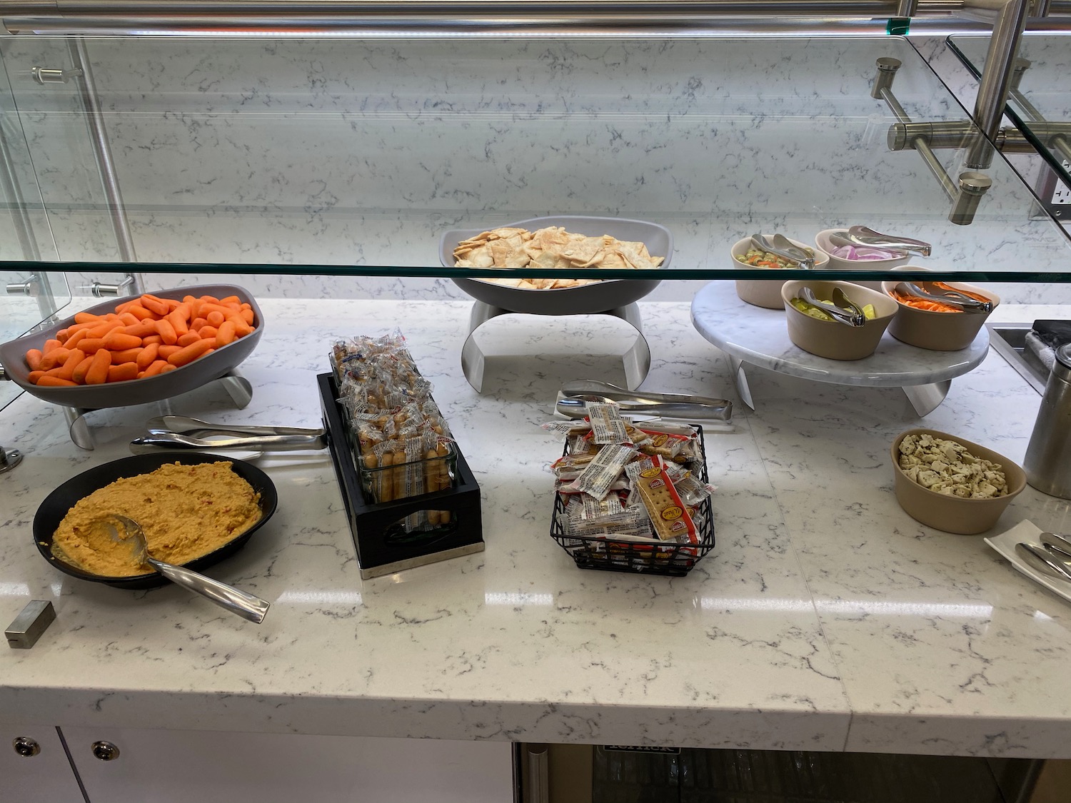 a buffet with different food items on it