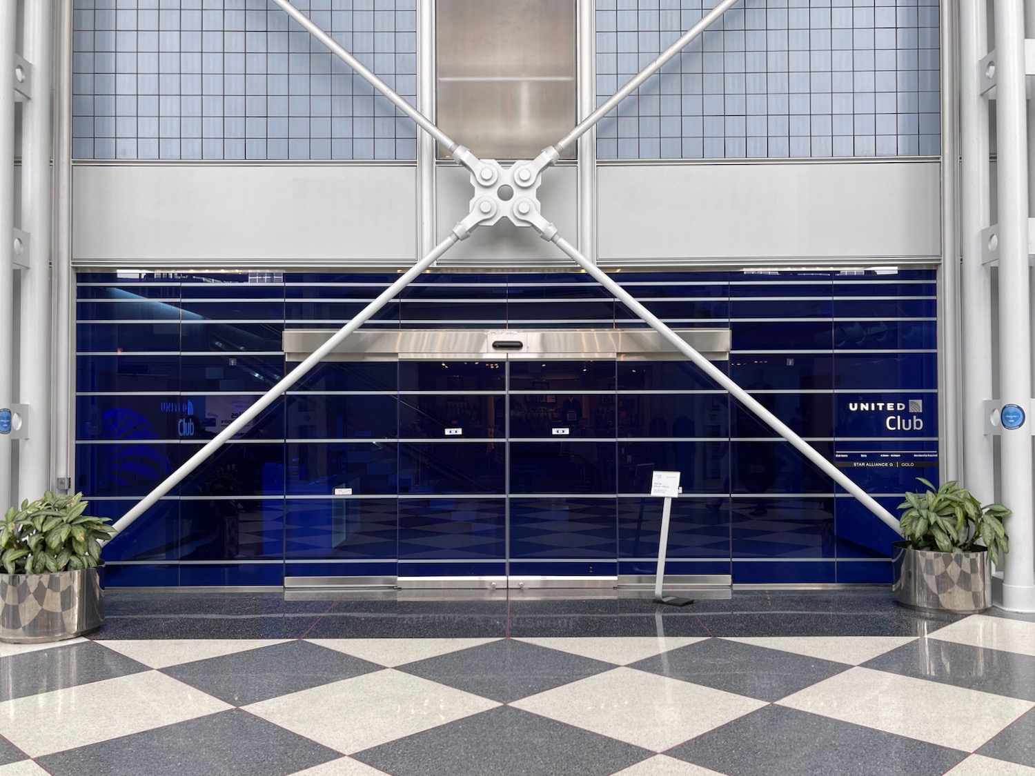 a large metal cross on a wall