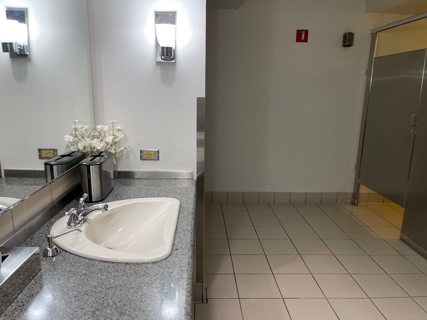 a bathroom with a sink and a shower