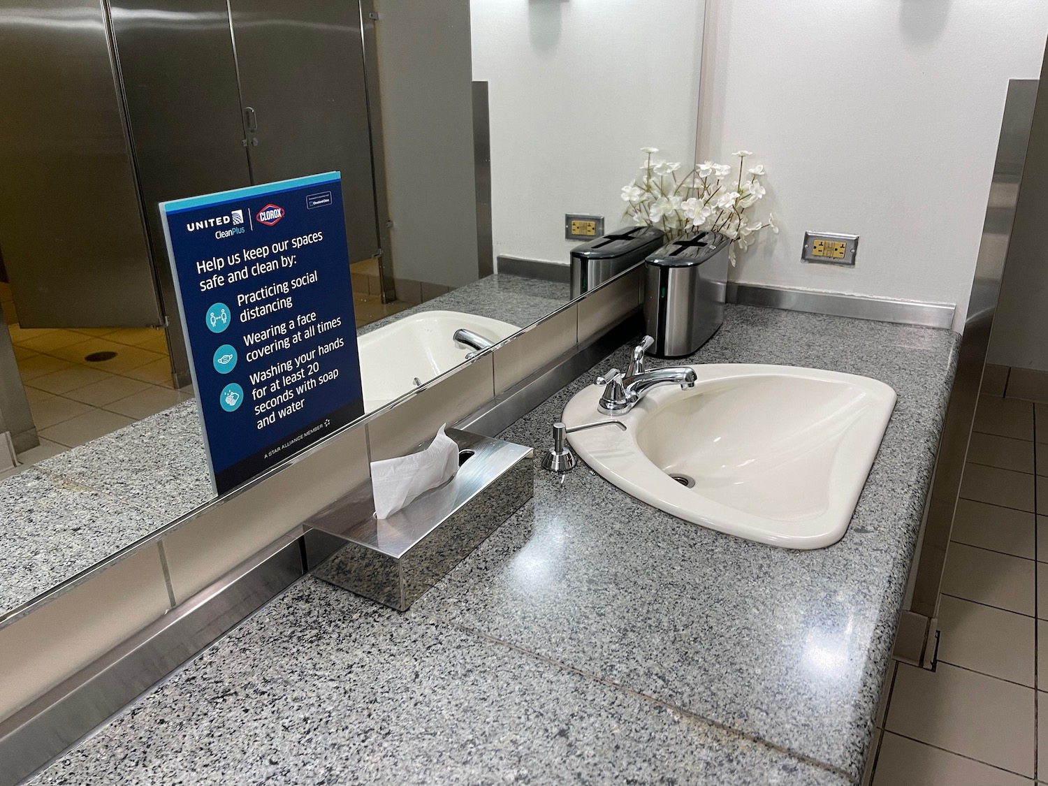 a bathroom sink and mirror