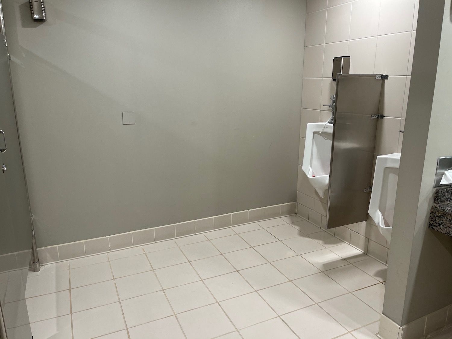 a urinals in a bathroom