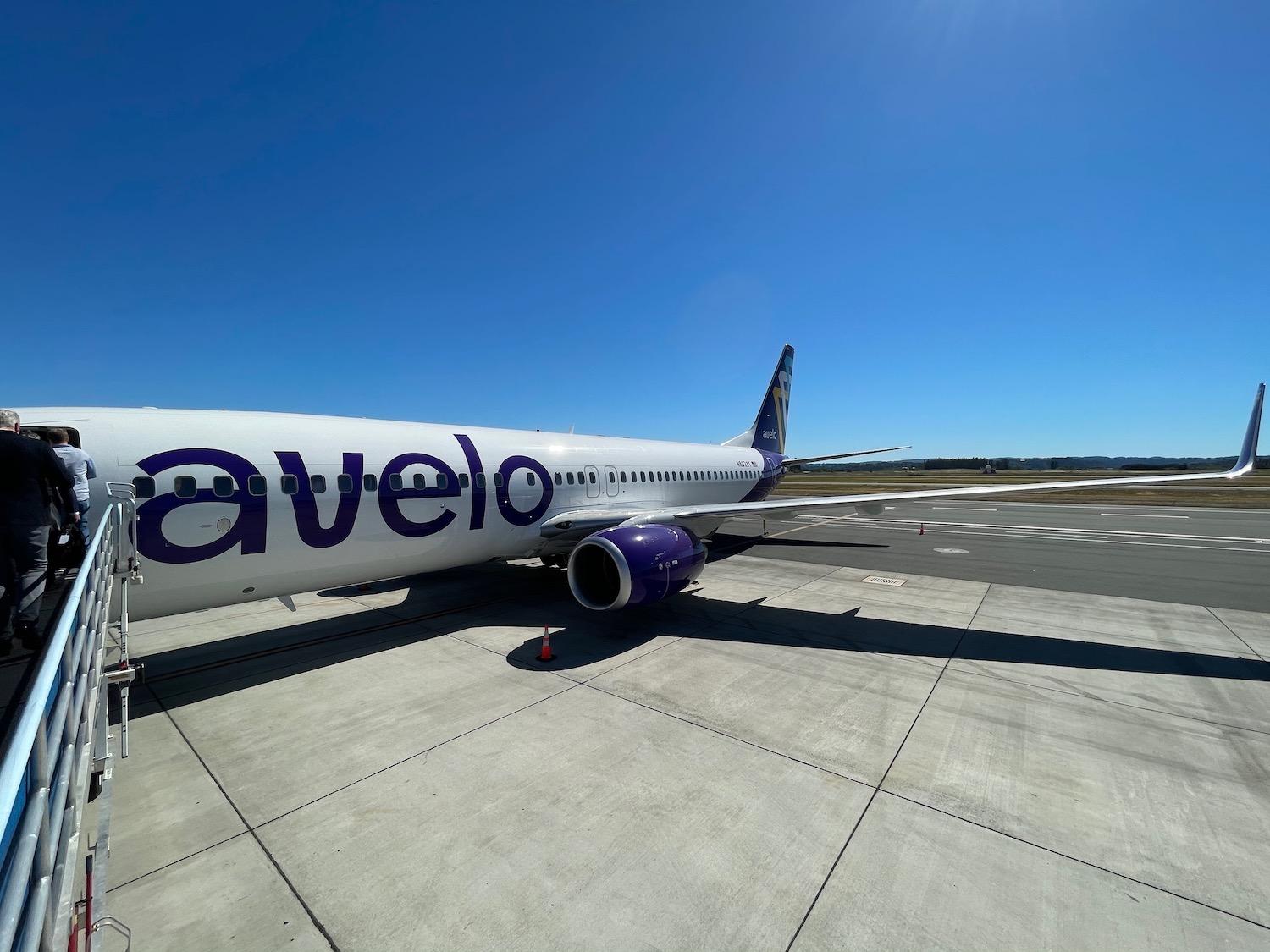 a large white airplane on a runway