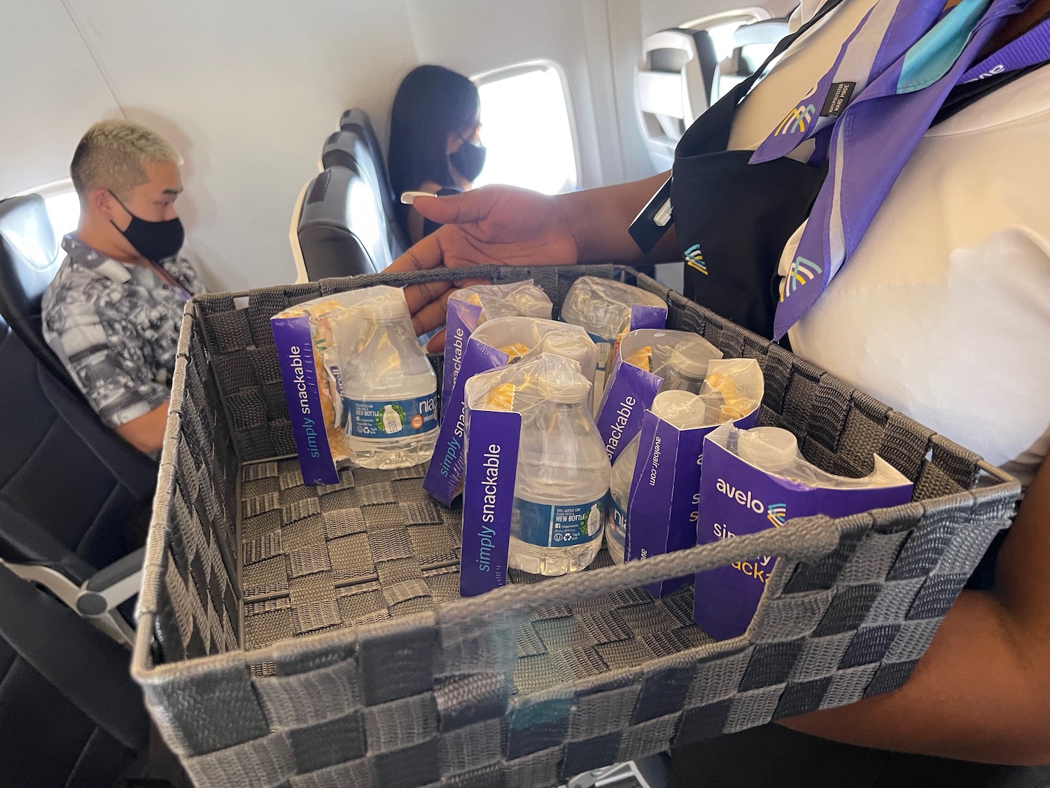 a person holding a basket of food