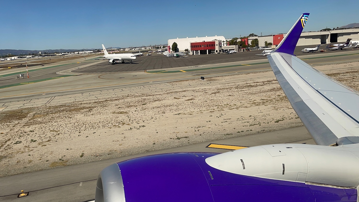 an airplane wing on a runway