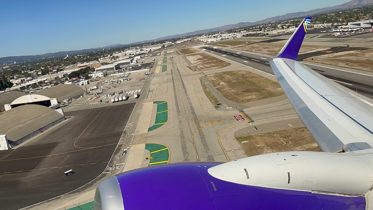 an airplane wing on a runway