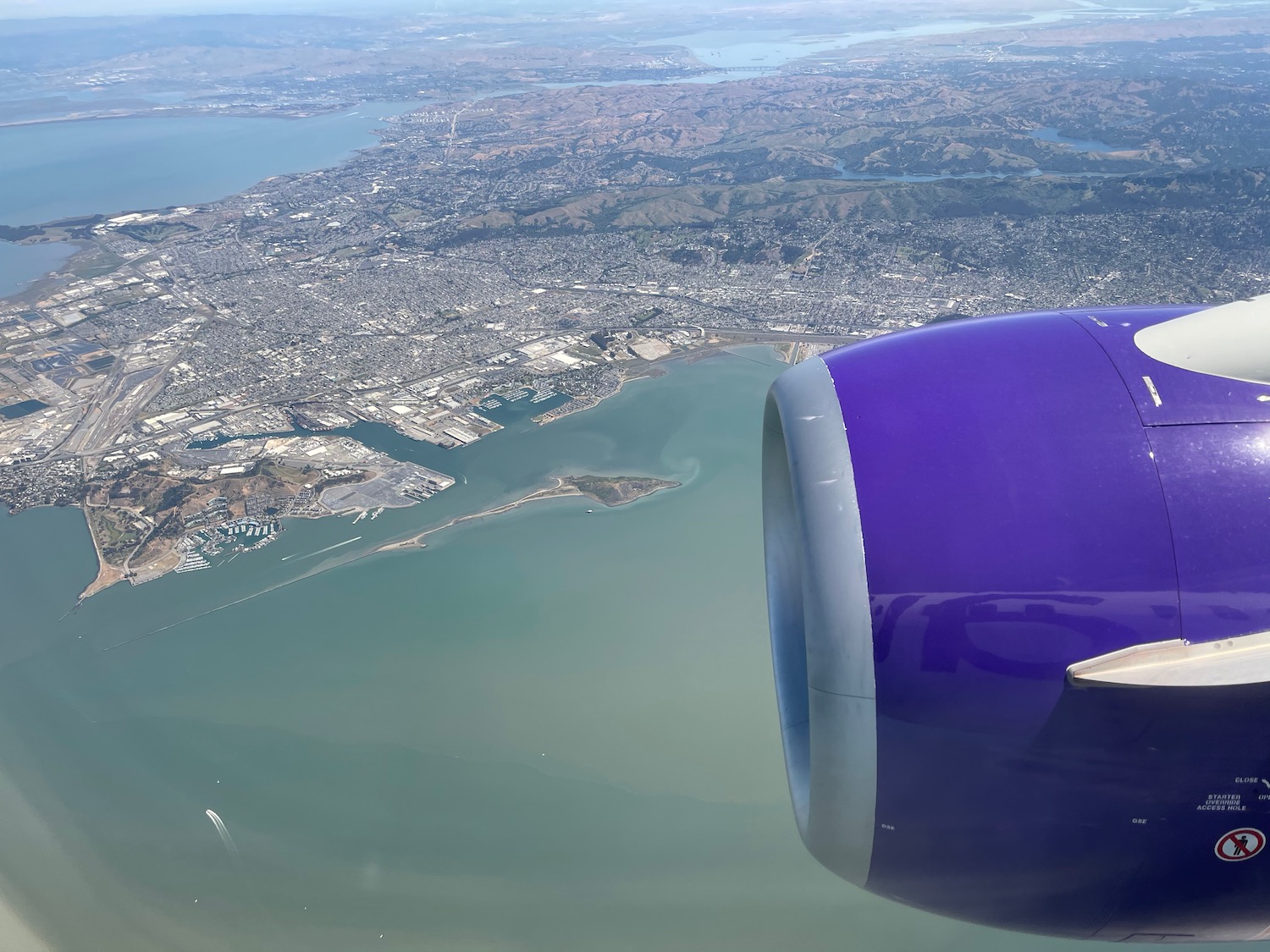 an airplane engine and a body of water