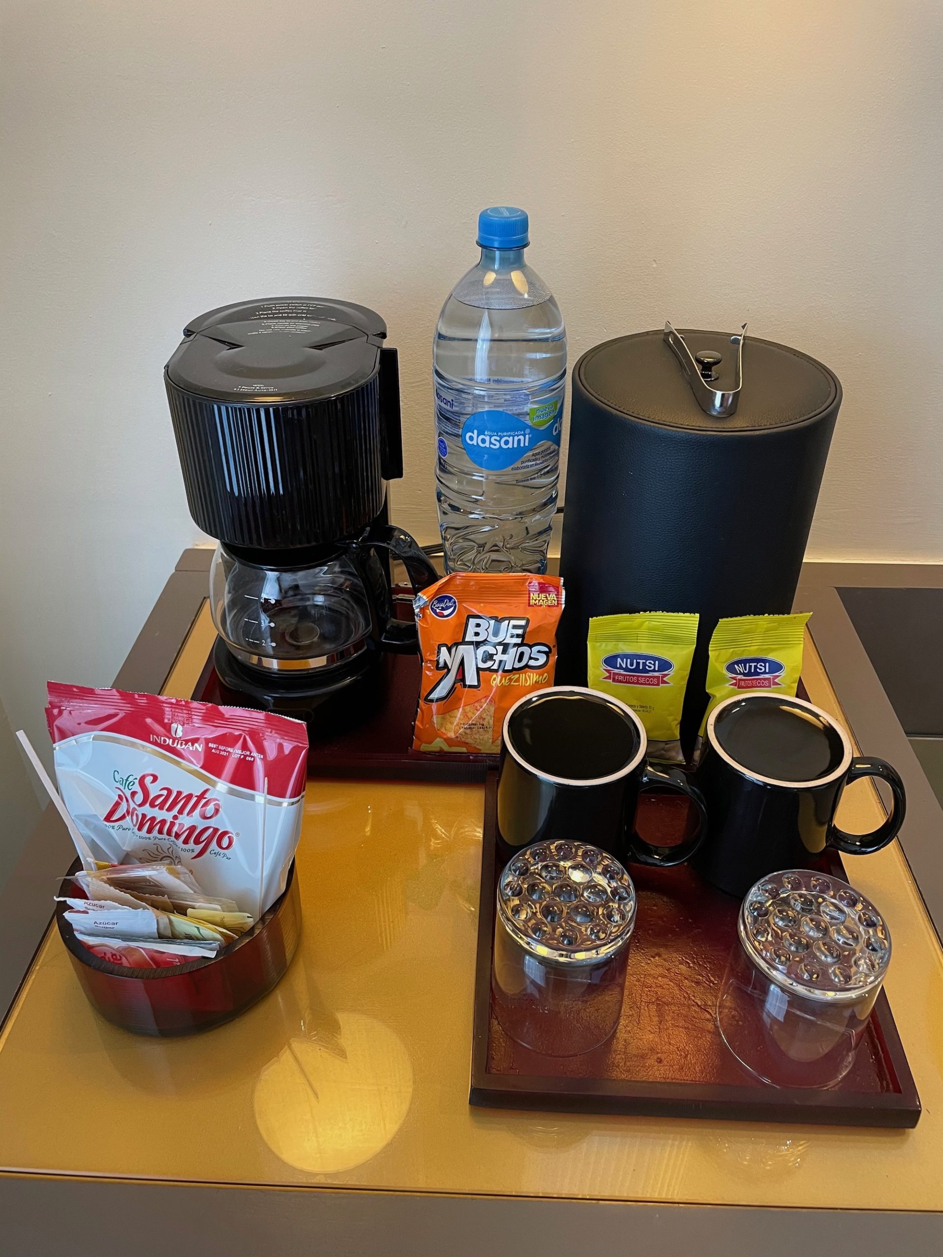 a coffee maker and other items on a table
