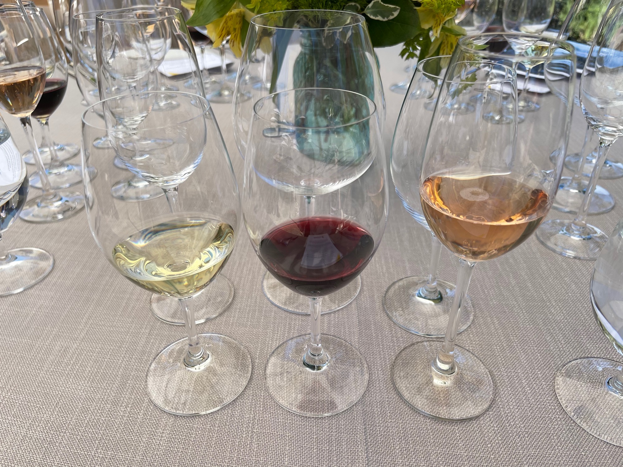 a group of wine glasses on a table