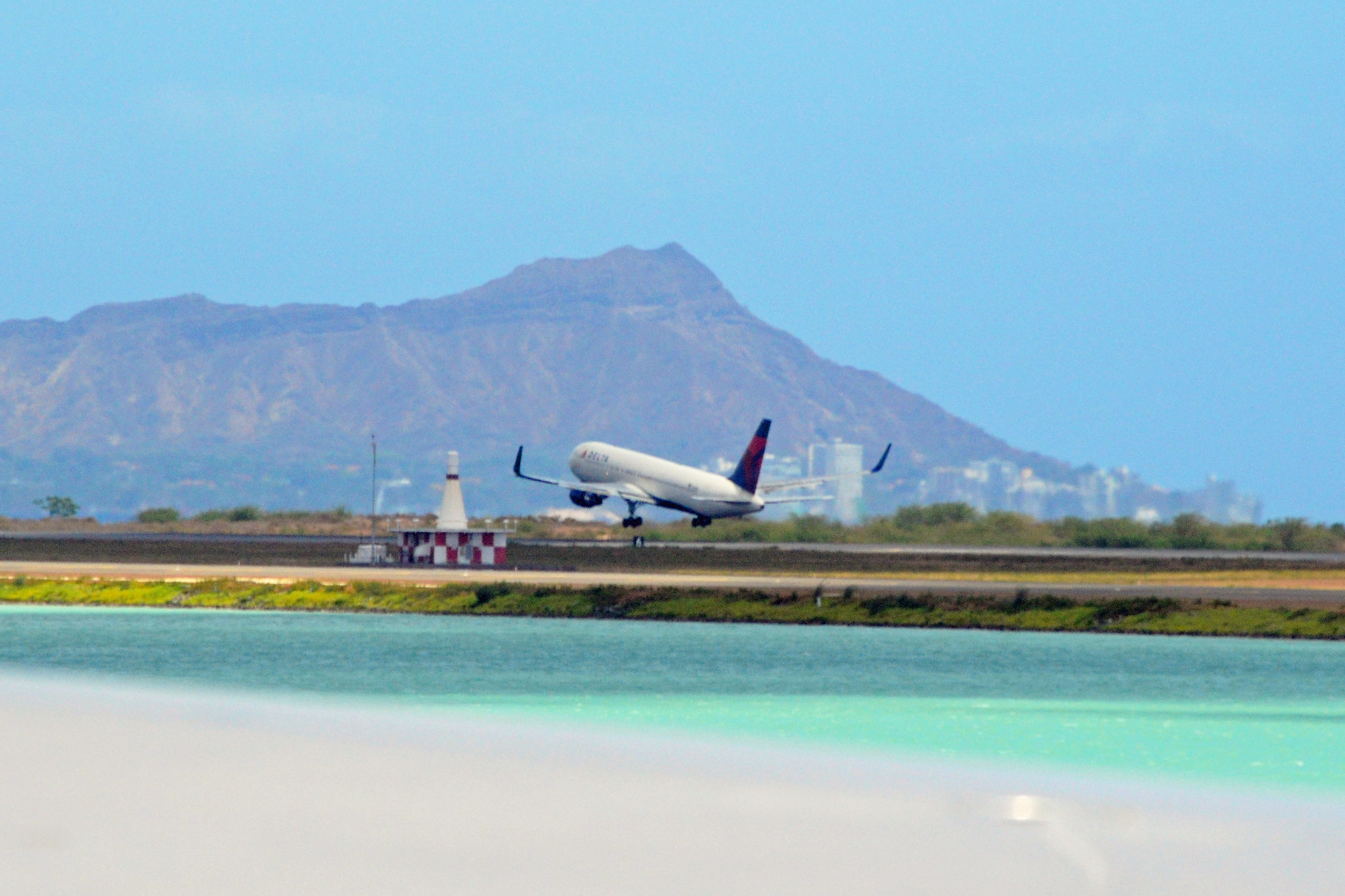 an airplane taking off from a runway