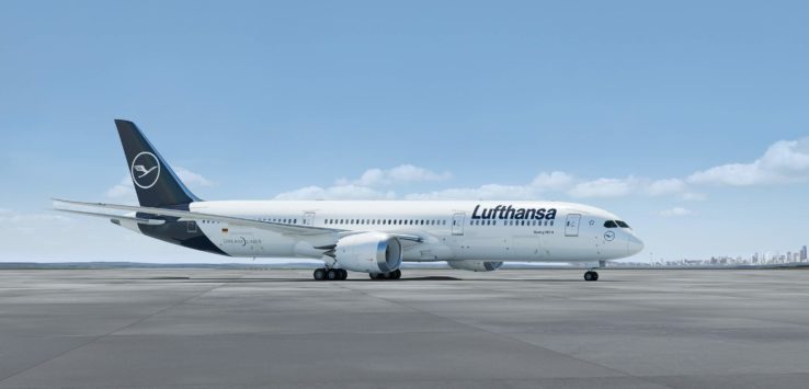 a white airplane on a runway