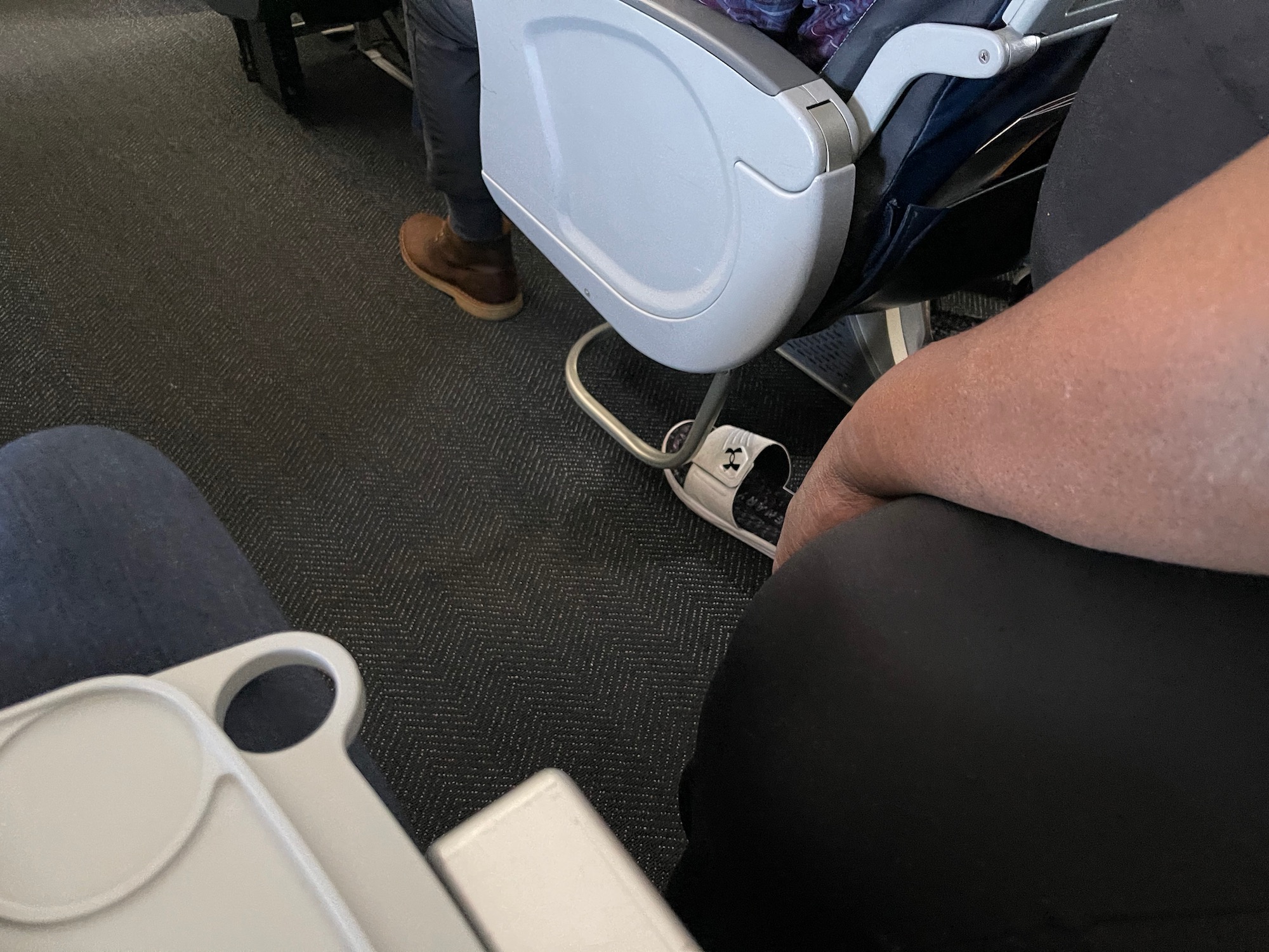 a person sitting in an airplane seat