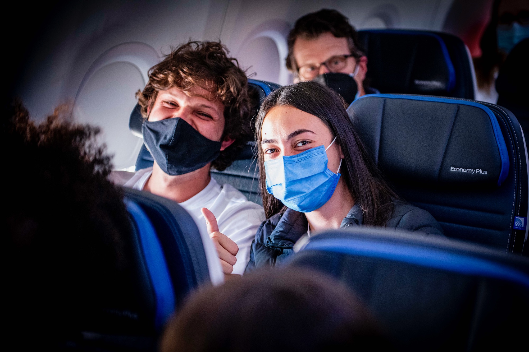 a group of people wearing face masks