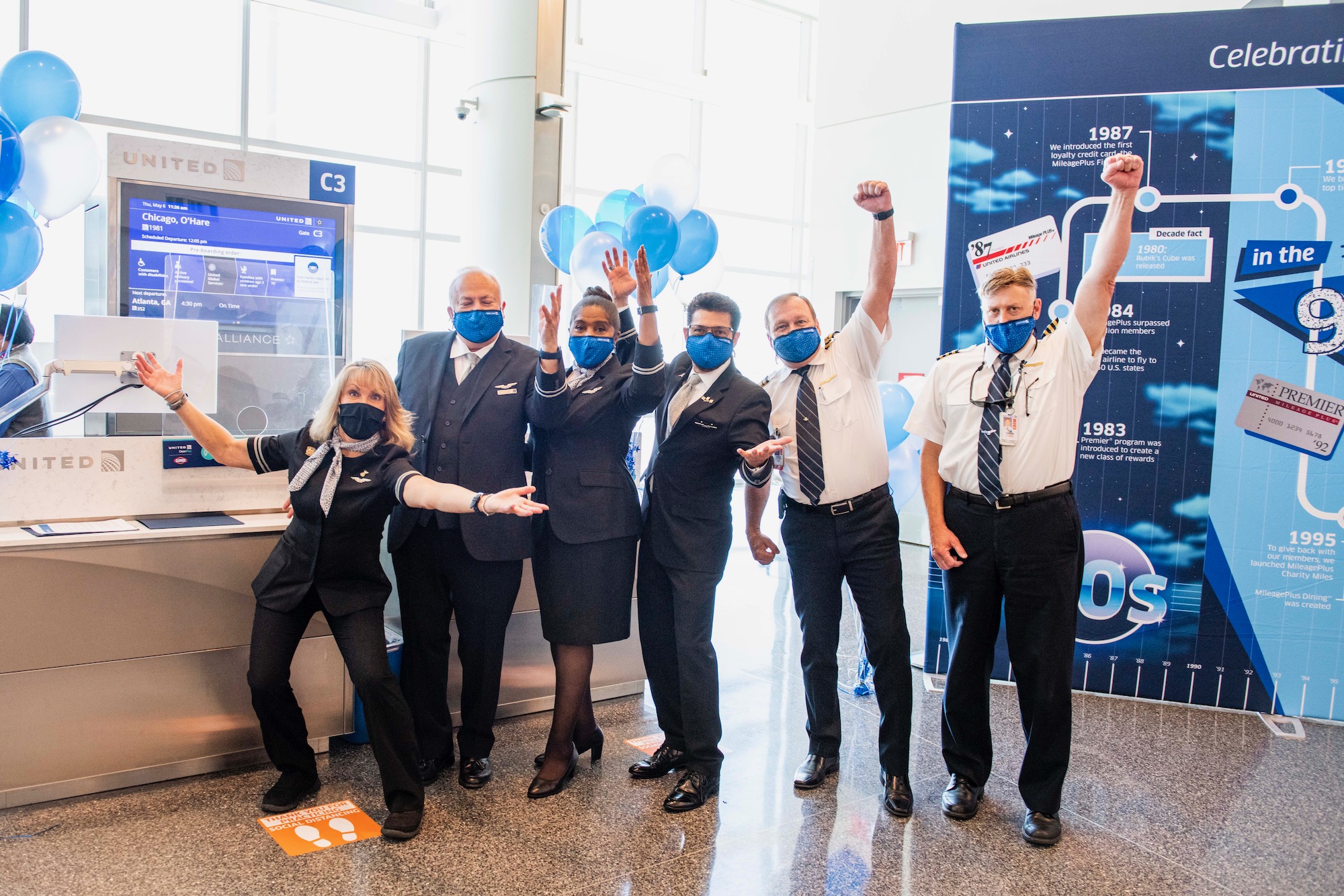 a group of people wearing face masks