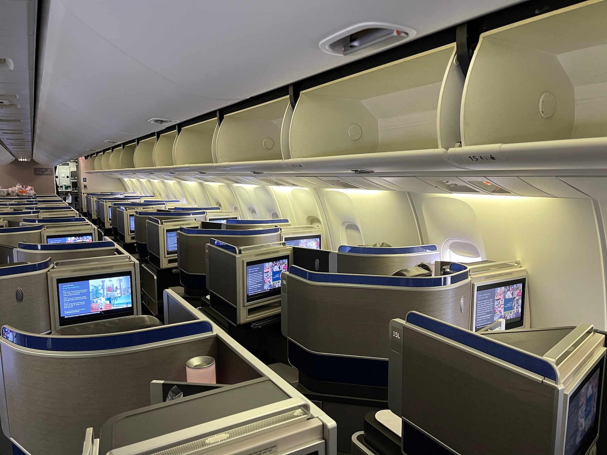 an airplane with rows of monitors