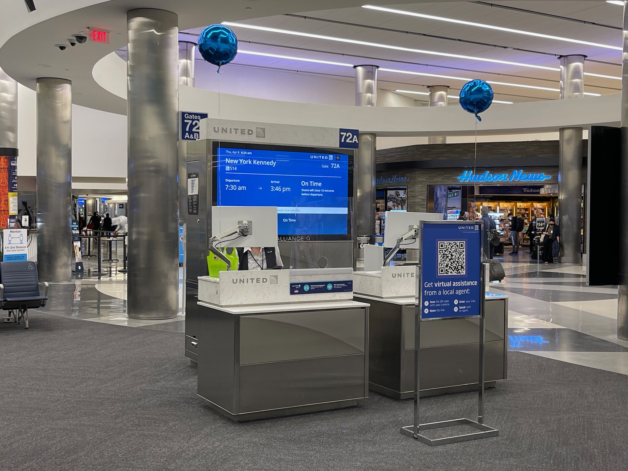 a group of people in a terminal