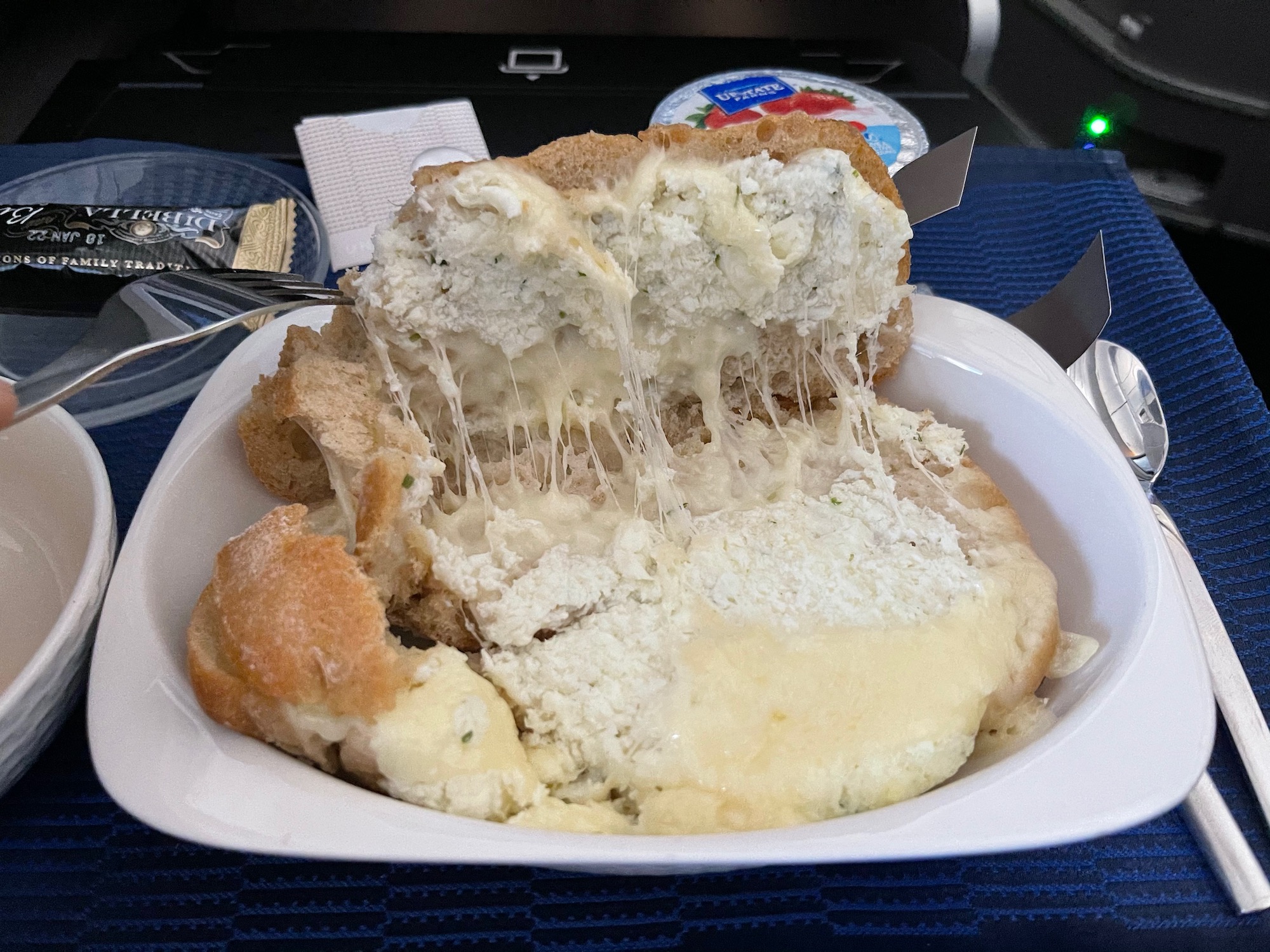a plate of food with cheese