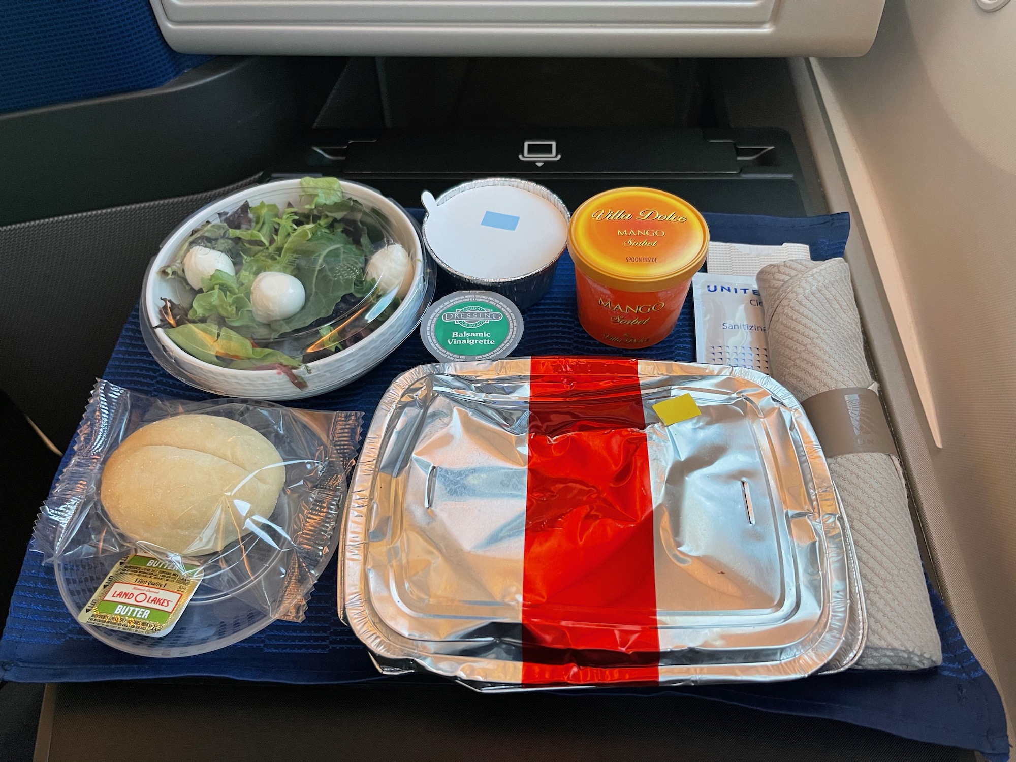 food on a tray in a plane