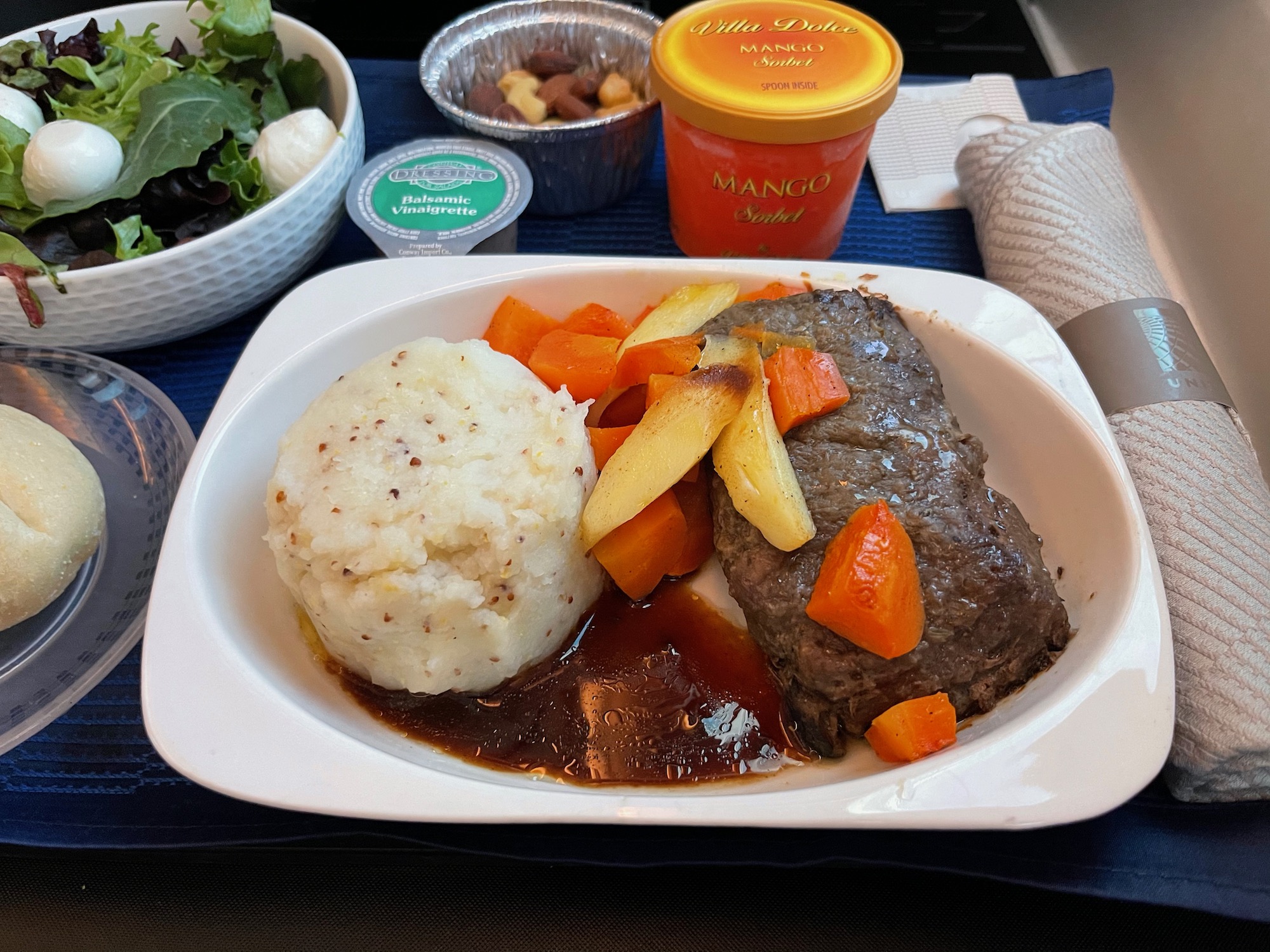 a plate of food on a tray