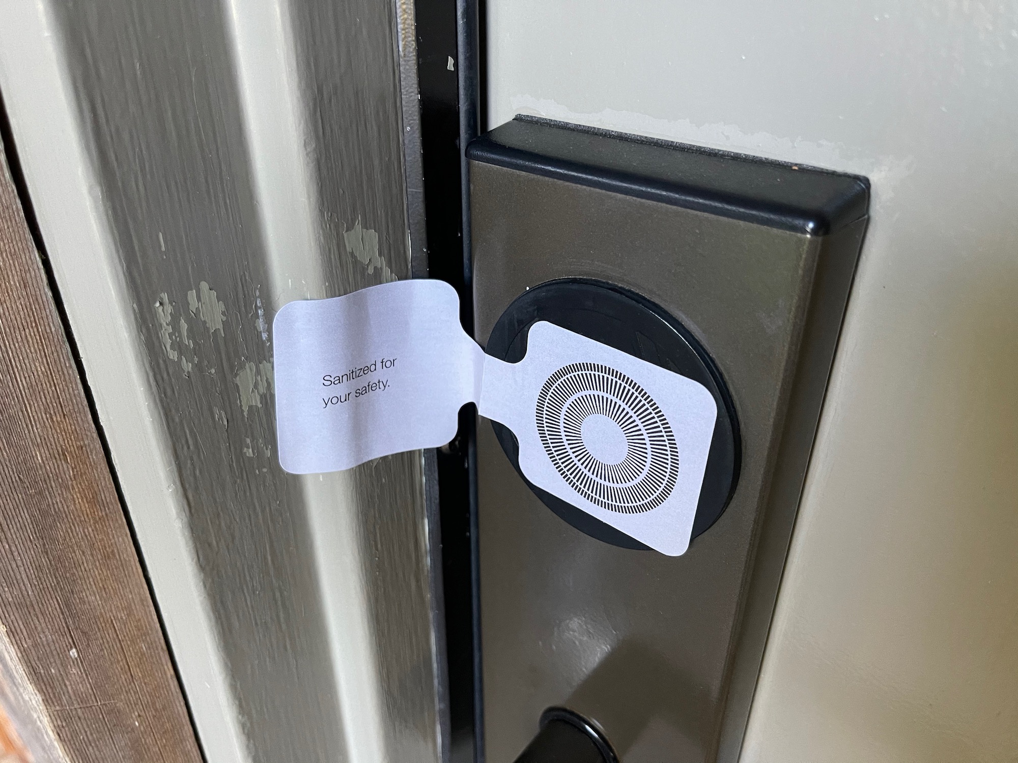 a white paper on a door handle