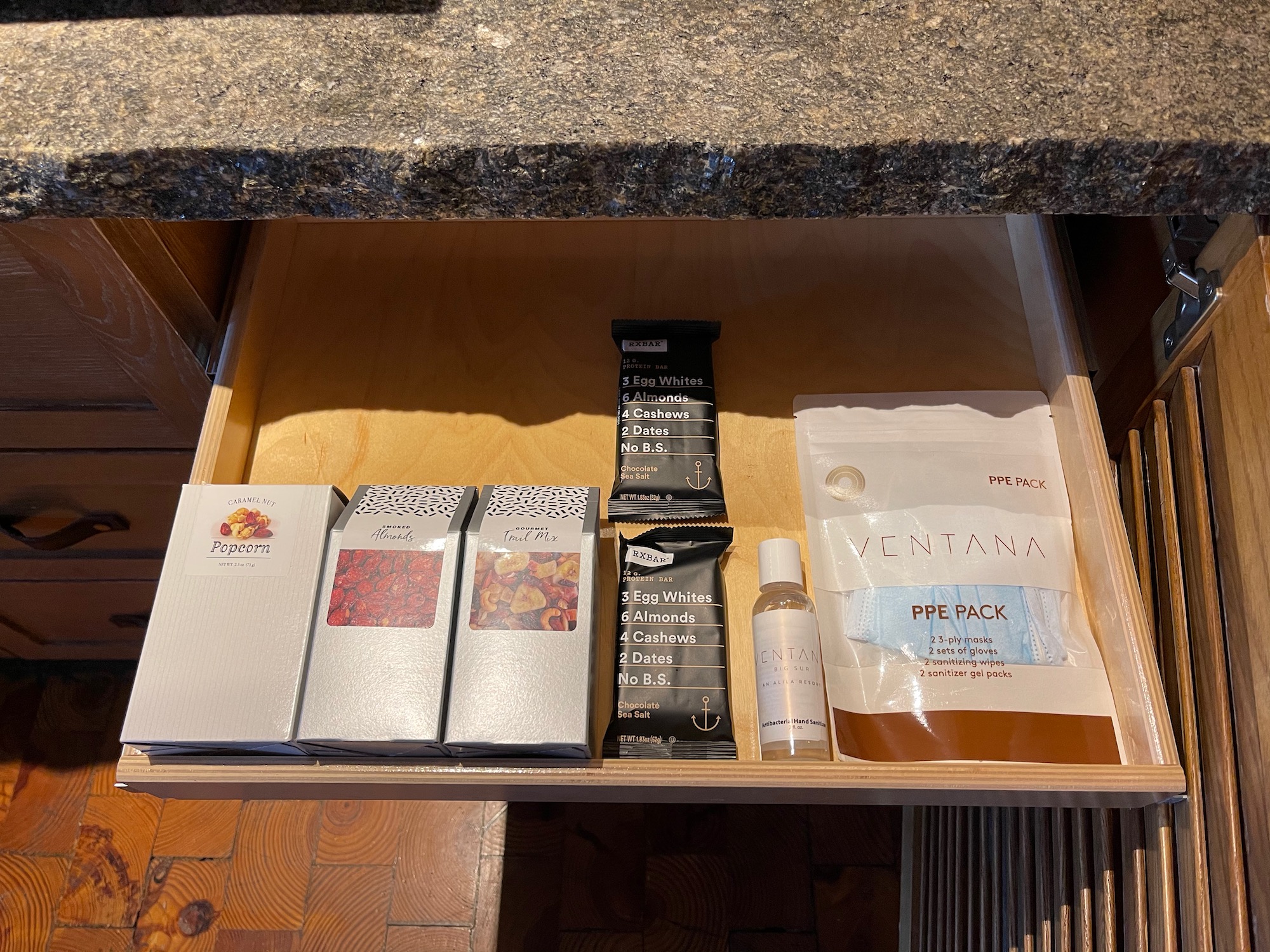 a drawer with food items on it