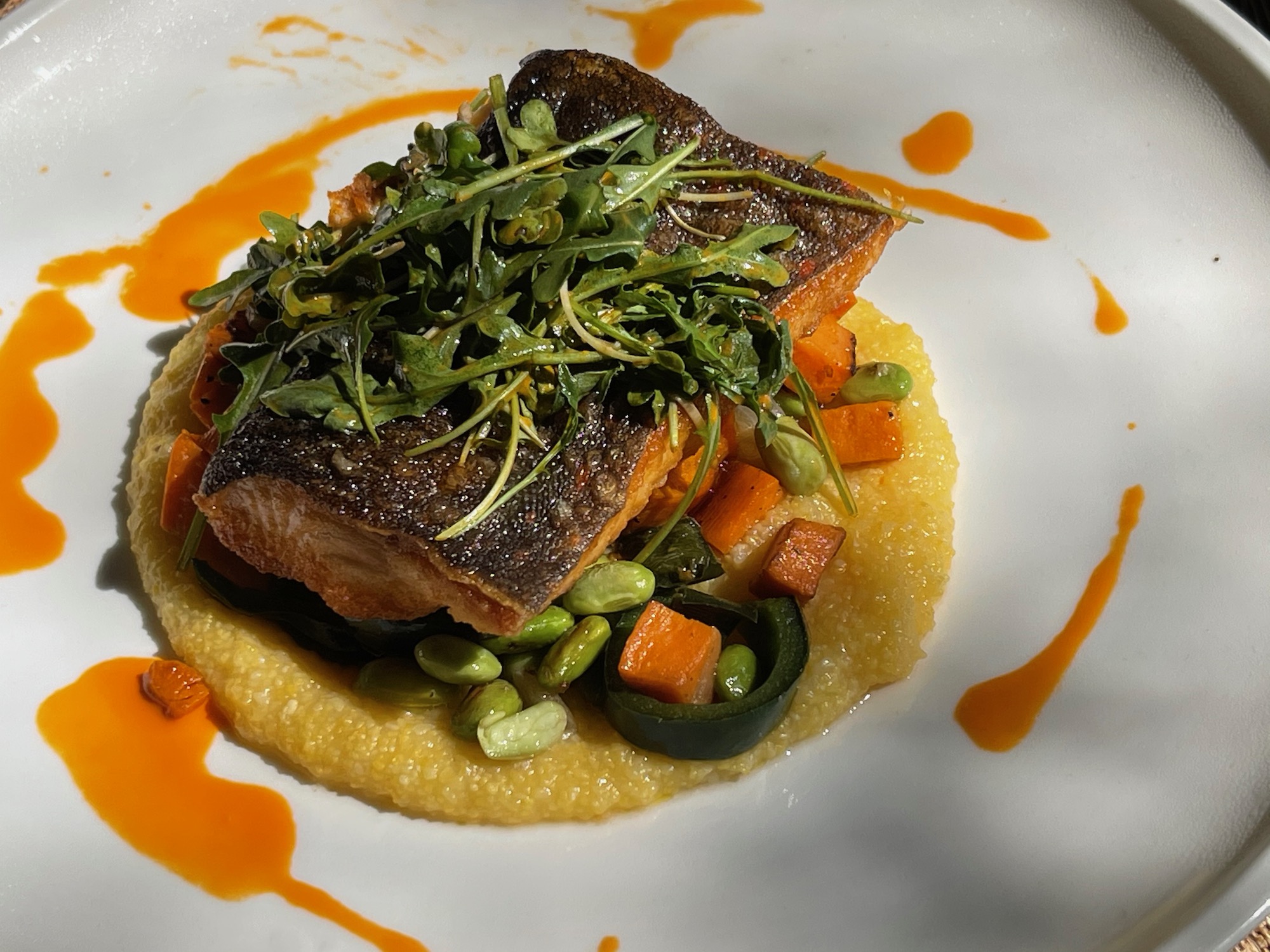 a plate of food on a white plate