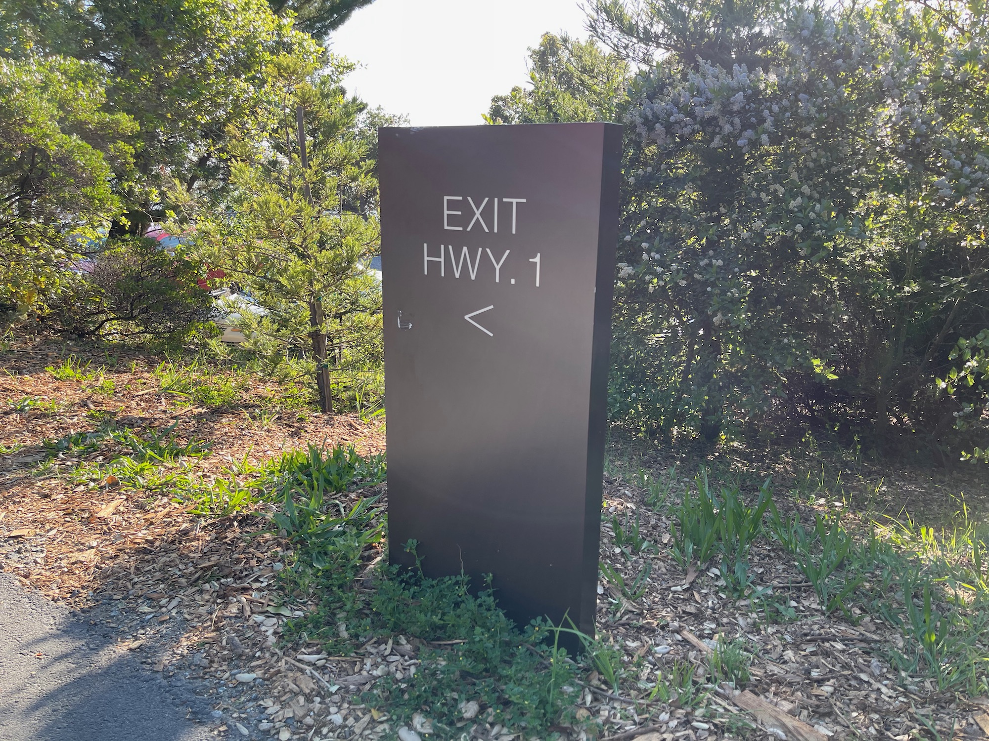 a sign in the grass