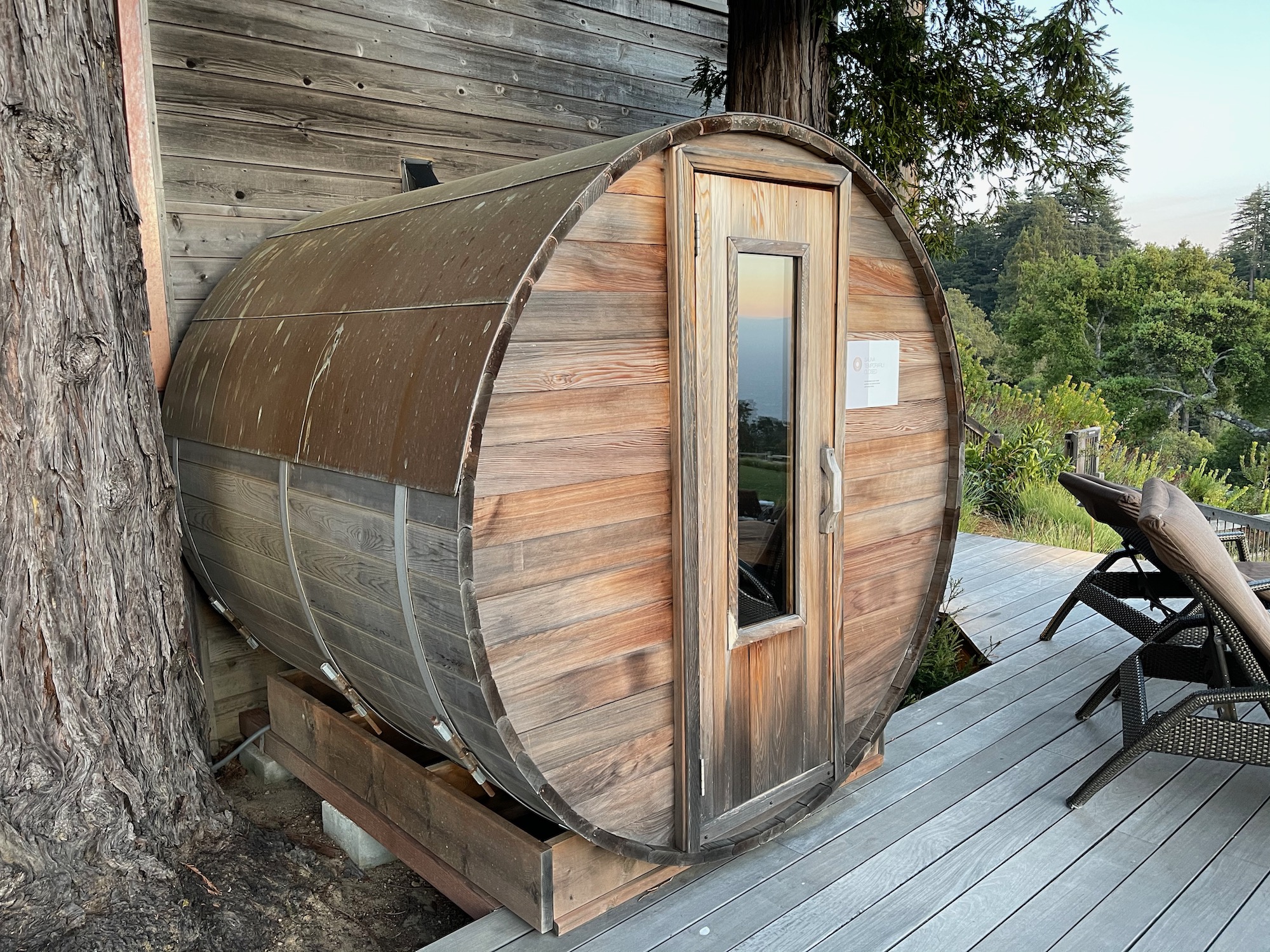 a barrel shaped building with a door and a window