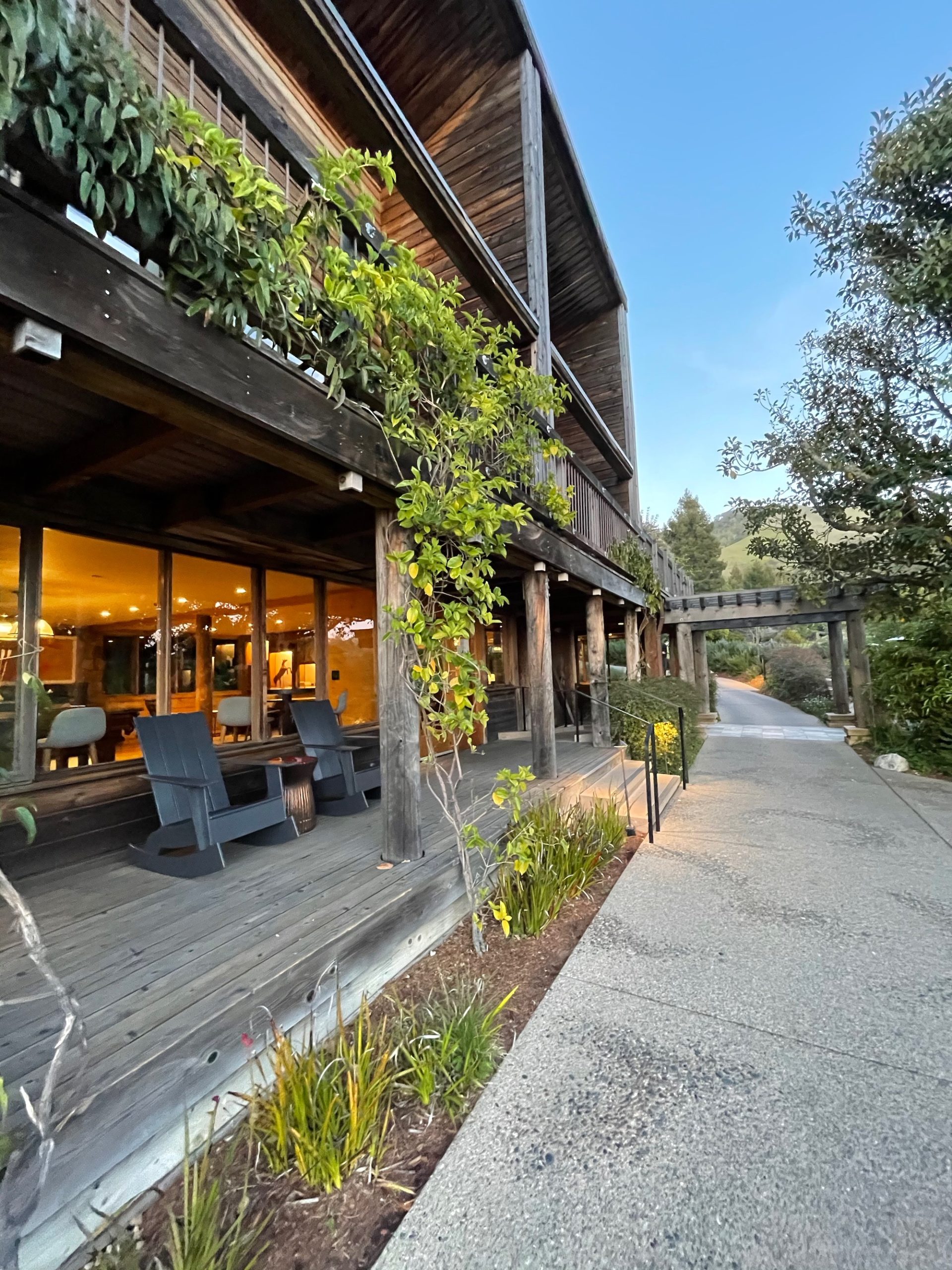 a building with a porch and a walkway