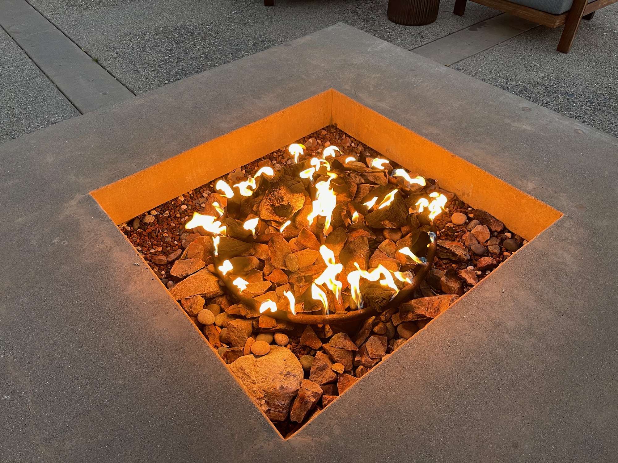 a fire pit with a square fire pit