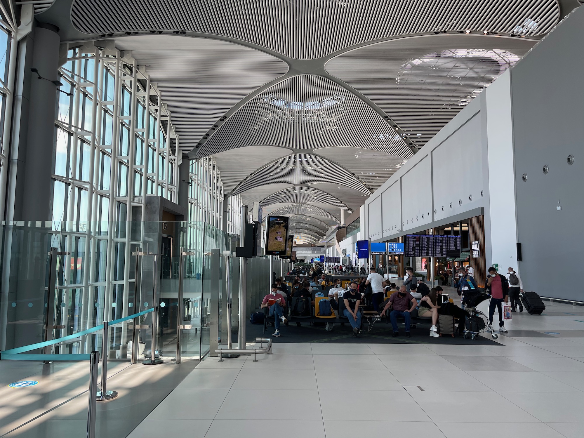 a group of people sitting in a terminal