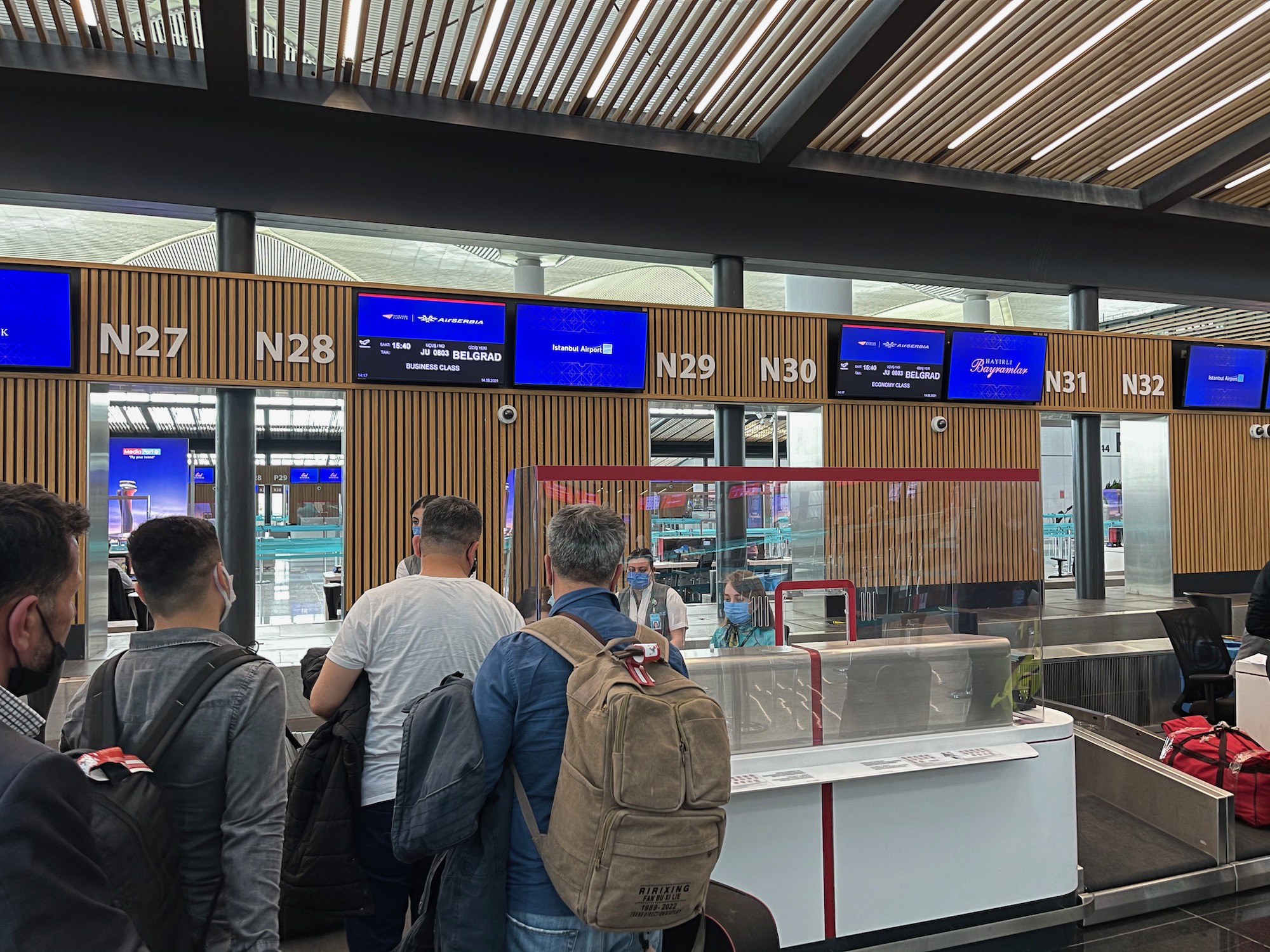 people standing in front of a counter