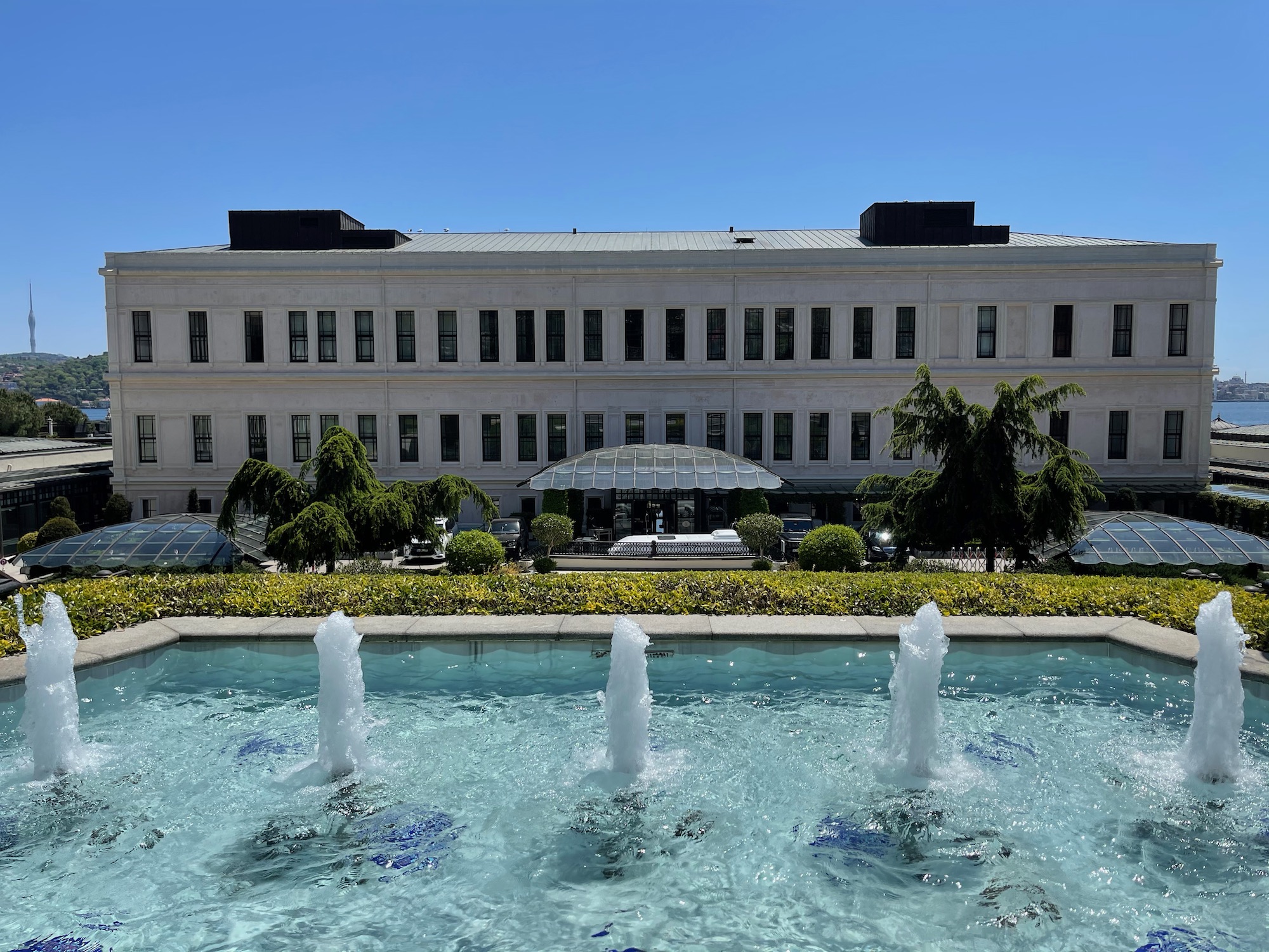 a water fountain in front of a building